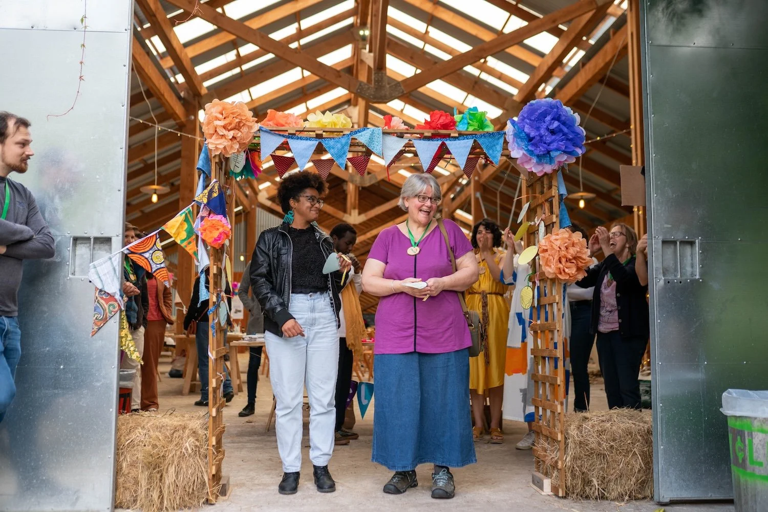 Makers Huddle Showcase - Two women standing under bunting