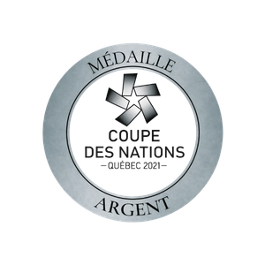 Médaille argentée avec inscription 'Médaillé' en haut, 'Argent' en bas, et au centre une étoile avec le texte 'Coupe des Nations'