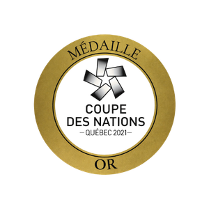 Médaille avec un ruban noir, entourée d'un cercle doré avec le texte 'Médaille d'Or' et 'Coupe des Nations".