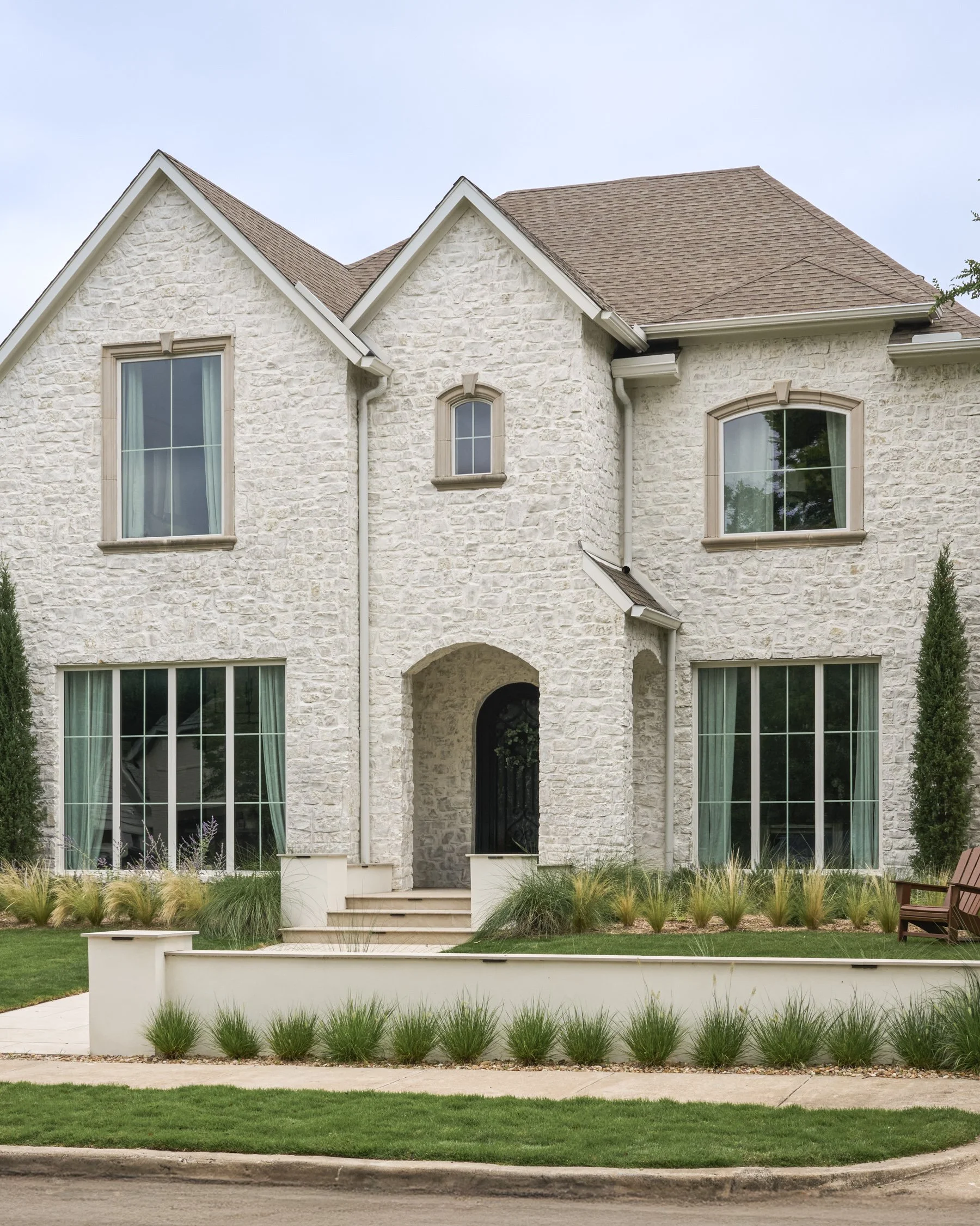 California-inspired front yard landscape with layered Ornamental Grasses in Dallas, TX | Designed by Caroline Higgins Design