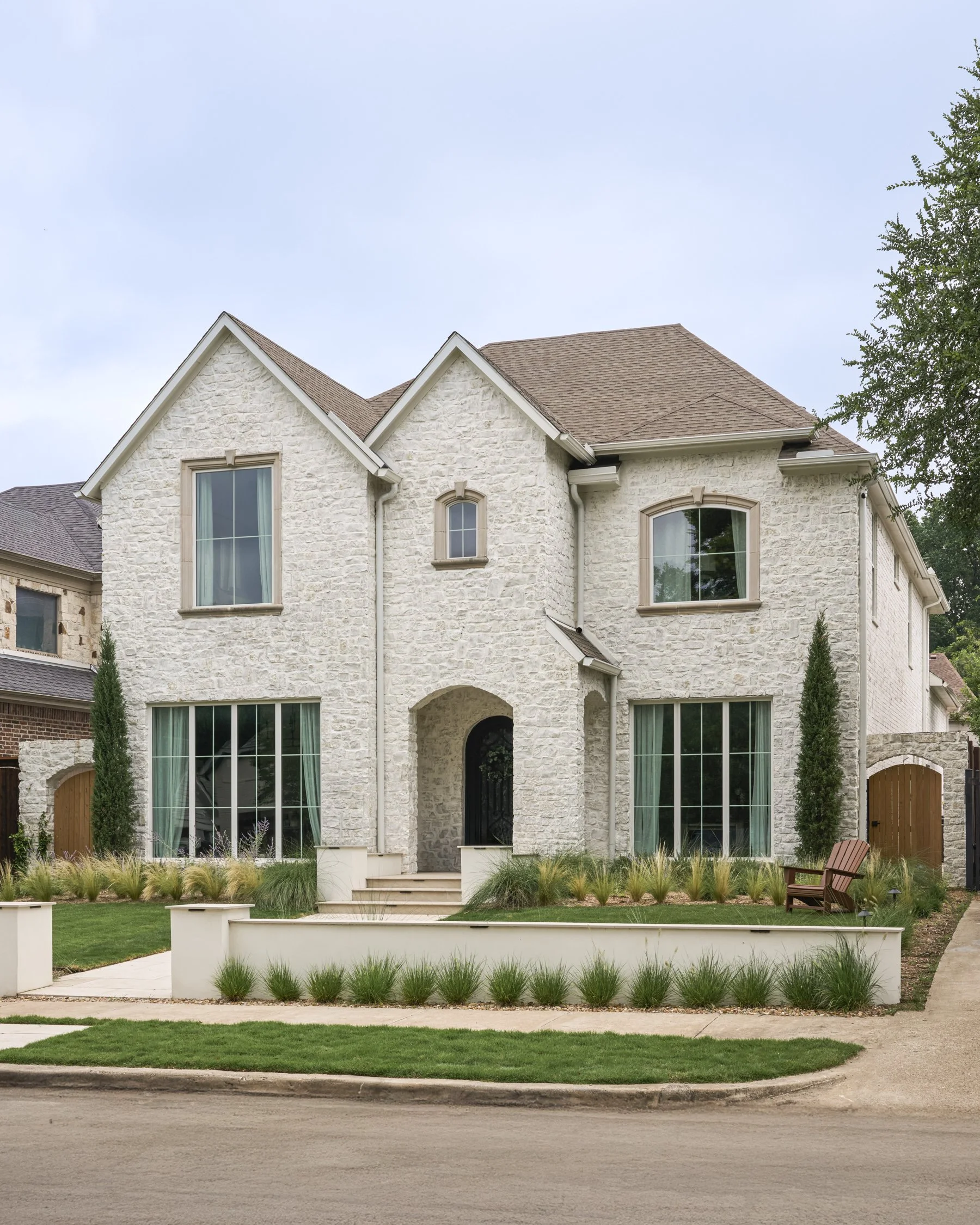 California-inspired front yard landscape with layered Ornamental Grasses in Dallas, TX | Designed by Caroline Higgins Design