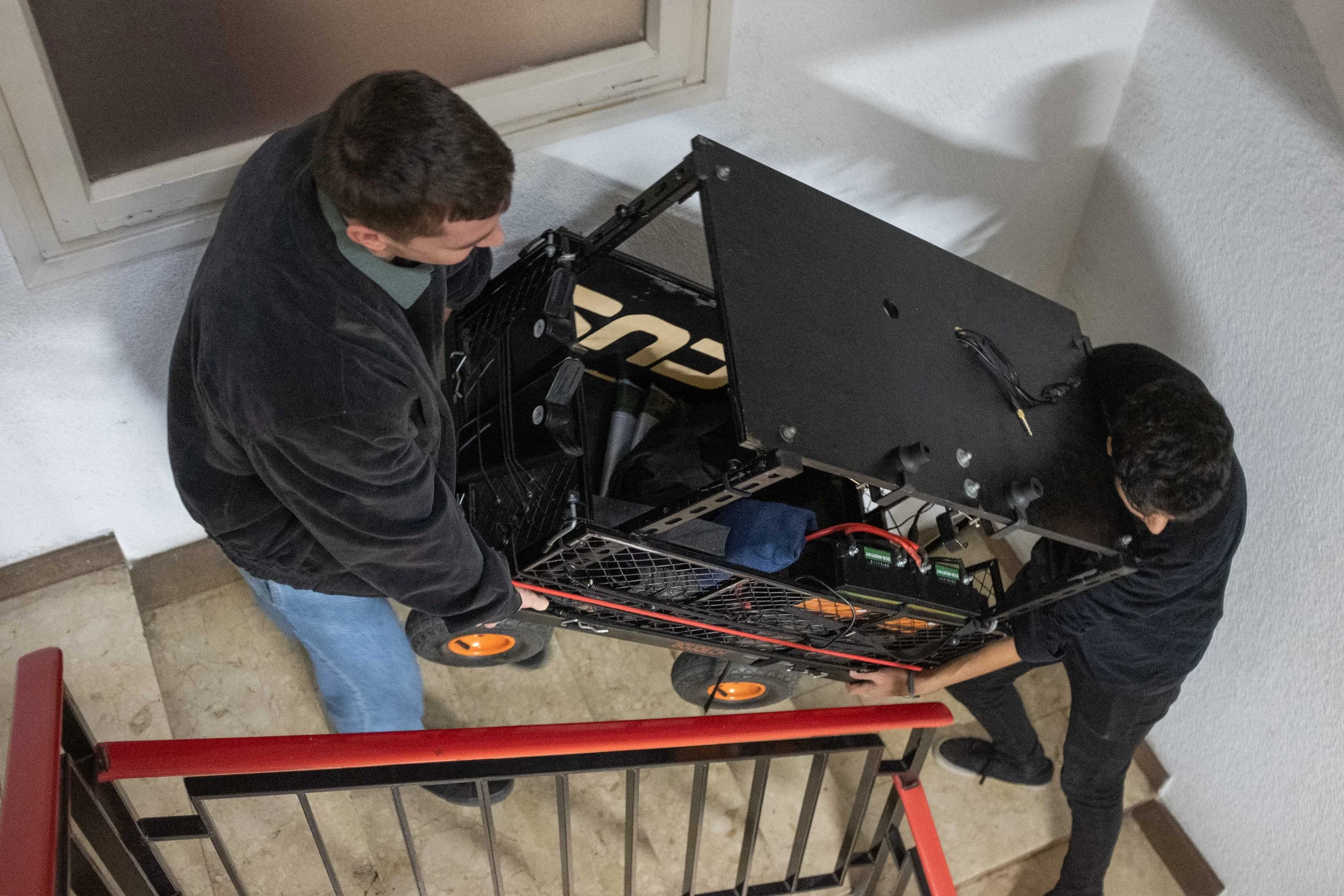 dragging our machine up the stairs . . . everyday