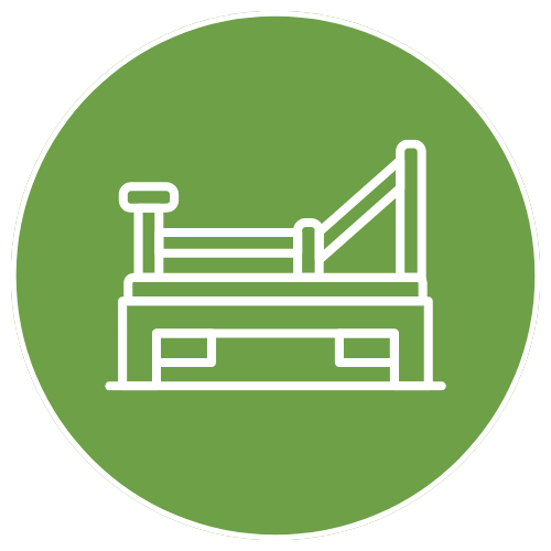 Icon of a hospital bed on a green circular background.