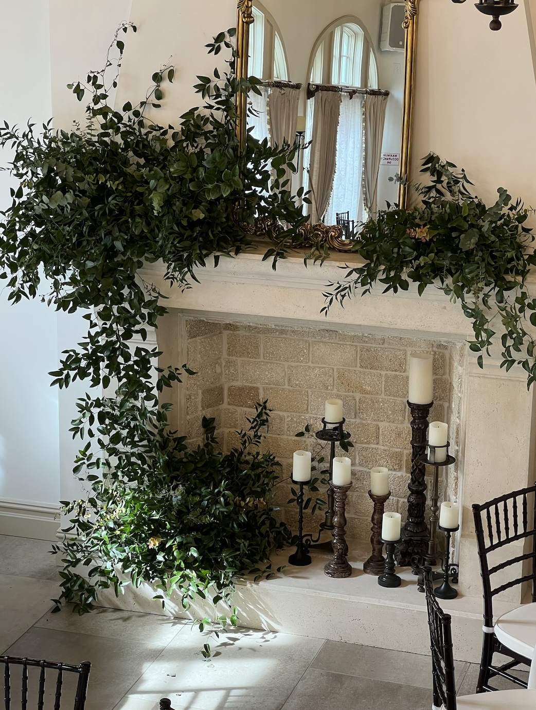 Historic St.Augustine greenery for intimate dinner fireplace setting.