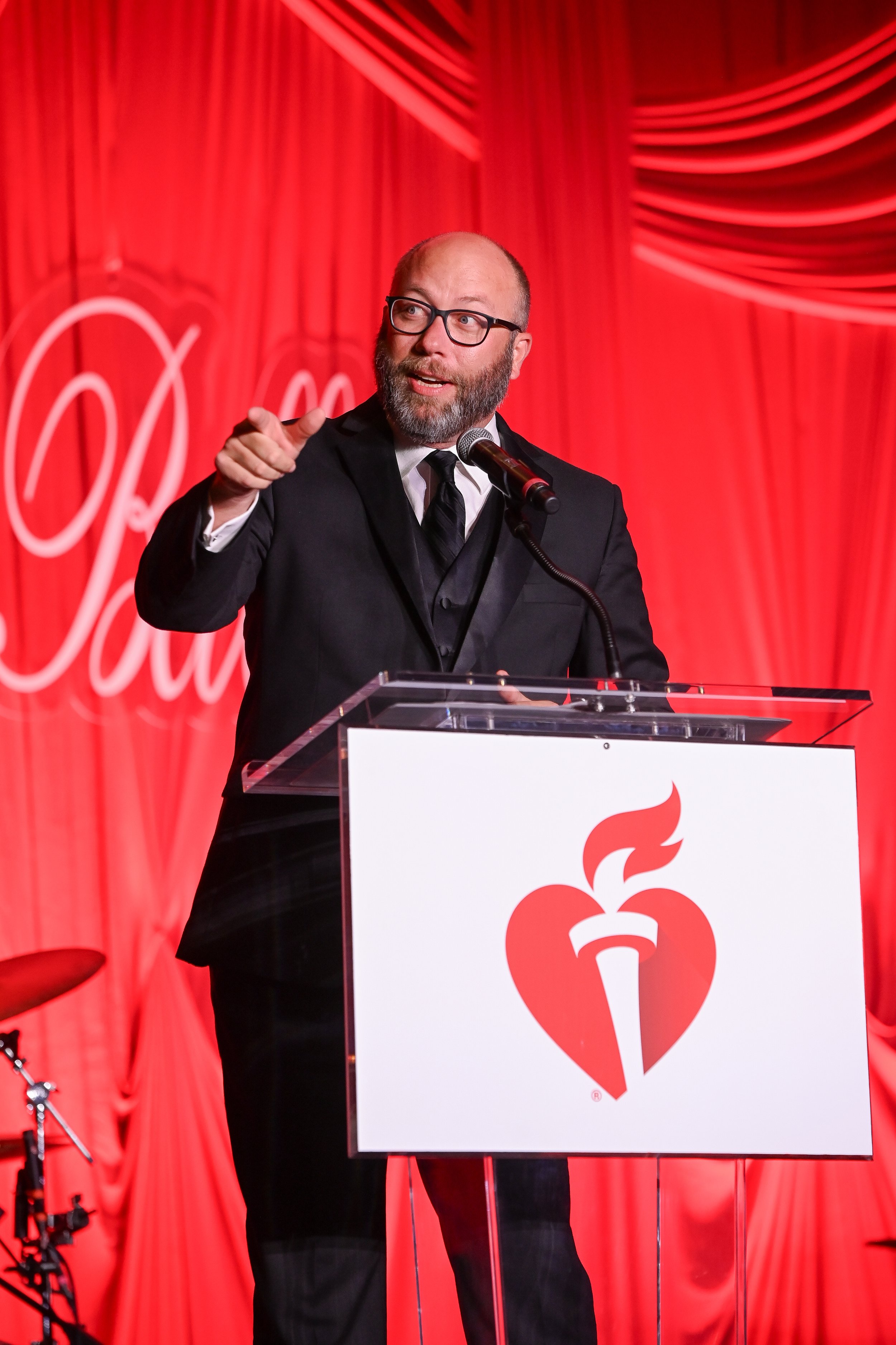 J.P. Shadrick speaking as master of ceremonies for the American Heart Association First Coast Heart Ball.