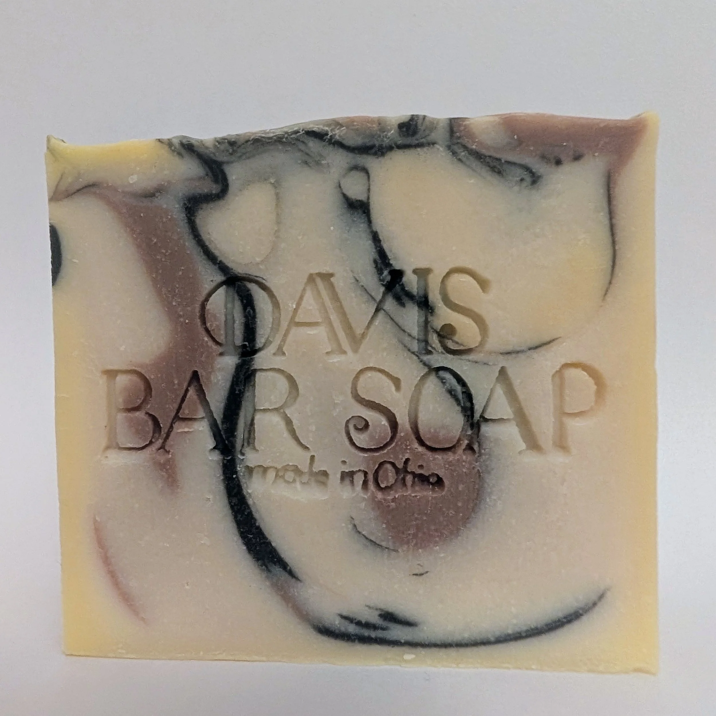 Women's sunshine bar soap with activated charcoal and pink clay