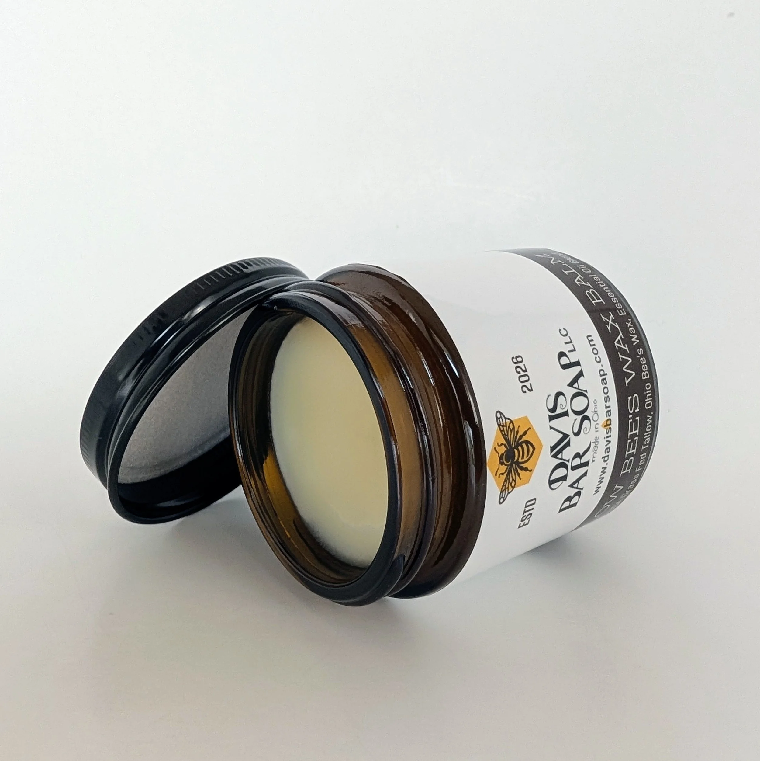 USA Grass Fed beef tallow, Ohio bees wax. Essential Oil Blend. Use on lips, face, hands, and whole body.