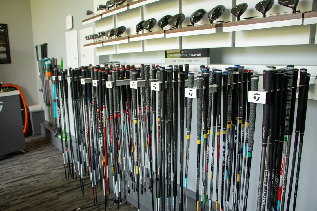 Display of golf clubs and golf drivers in the Fairview Mountain Golf Club Fitting Bay.