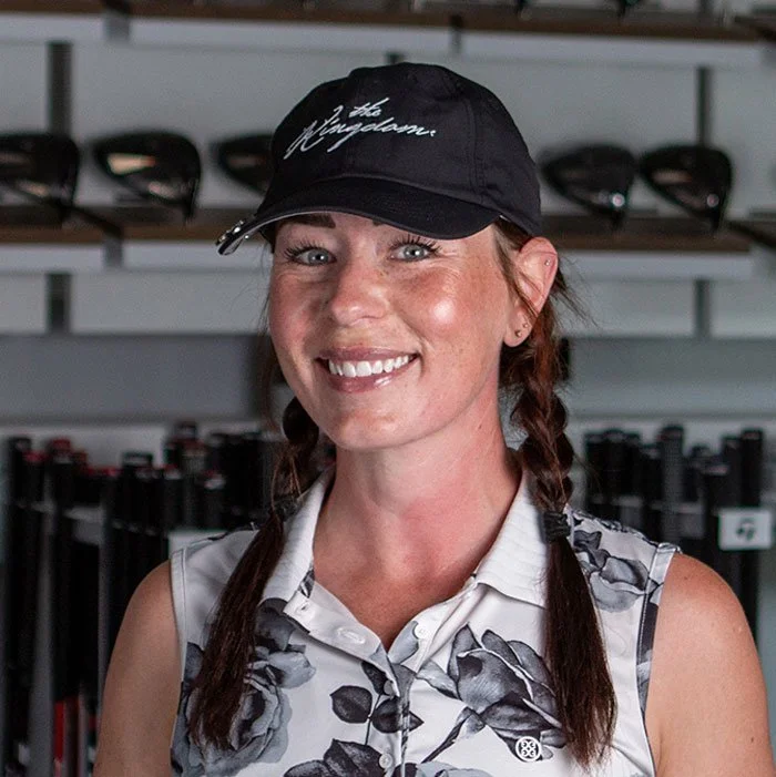 Fairview Mountain Golf Club associate professional Lis Deleo smiling in the fitting bay.