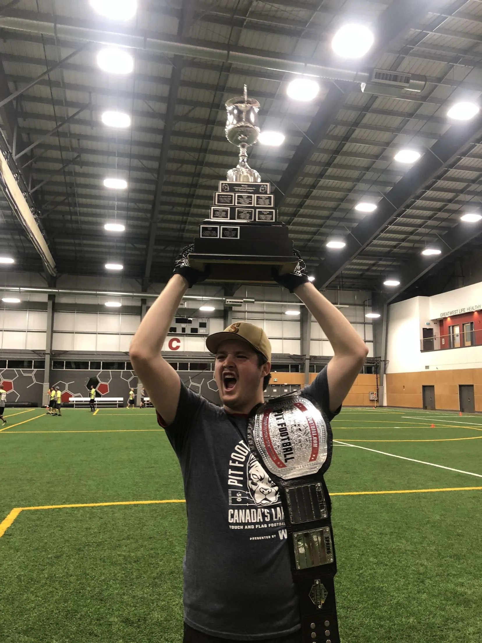 Image of a man with a trophy