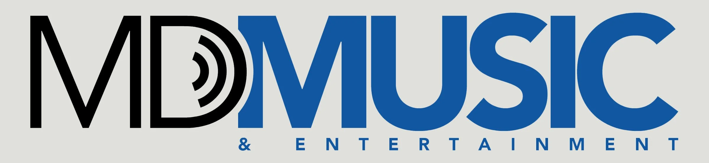 MDMusic & Entertainment logo with the word 'MUSIC' in large blue letters and 'MD' in black, alongside a circular design.