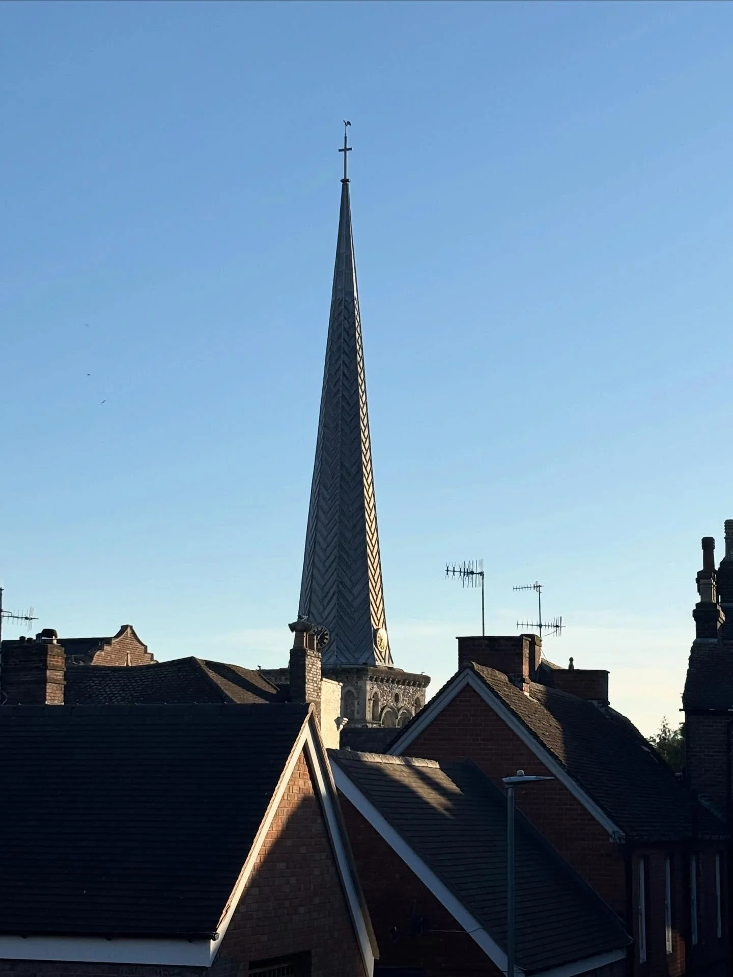 Old Town roof tops and a bright sky 

#aroundthecorner #roof #steeple #rooftop