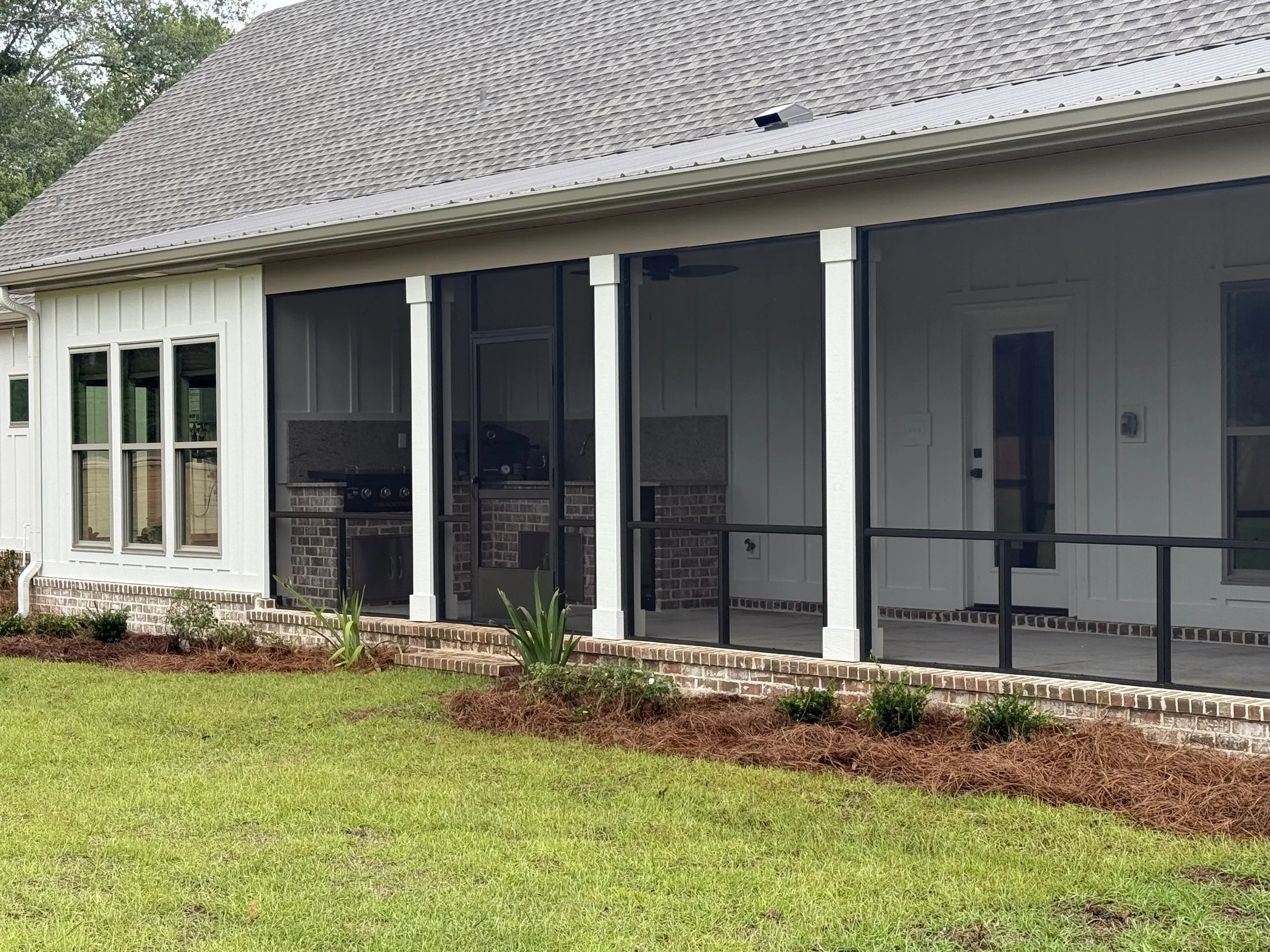 Mini outdoor kitchen/screened in porch