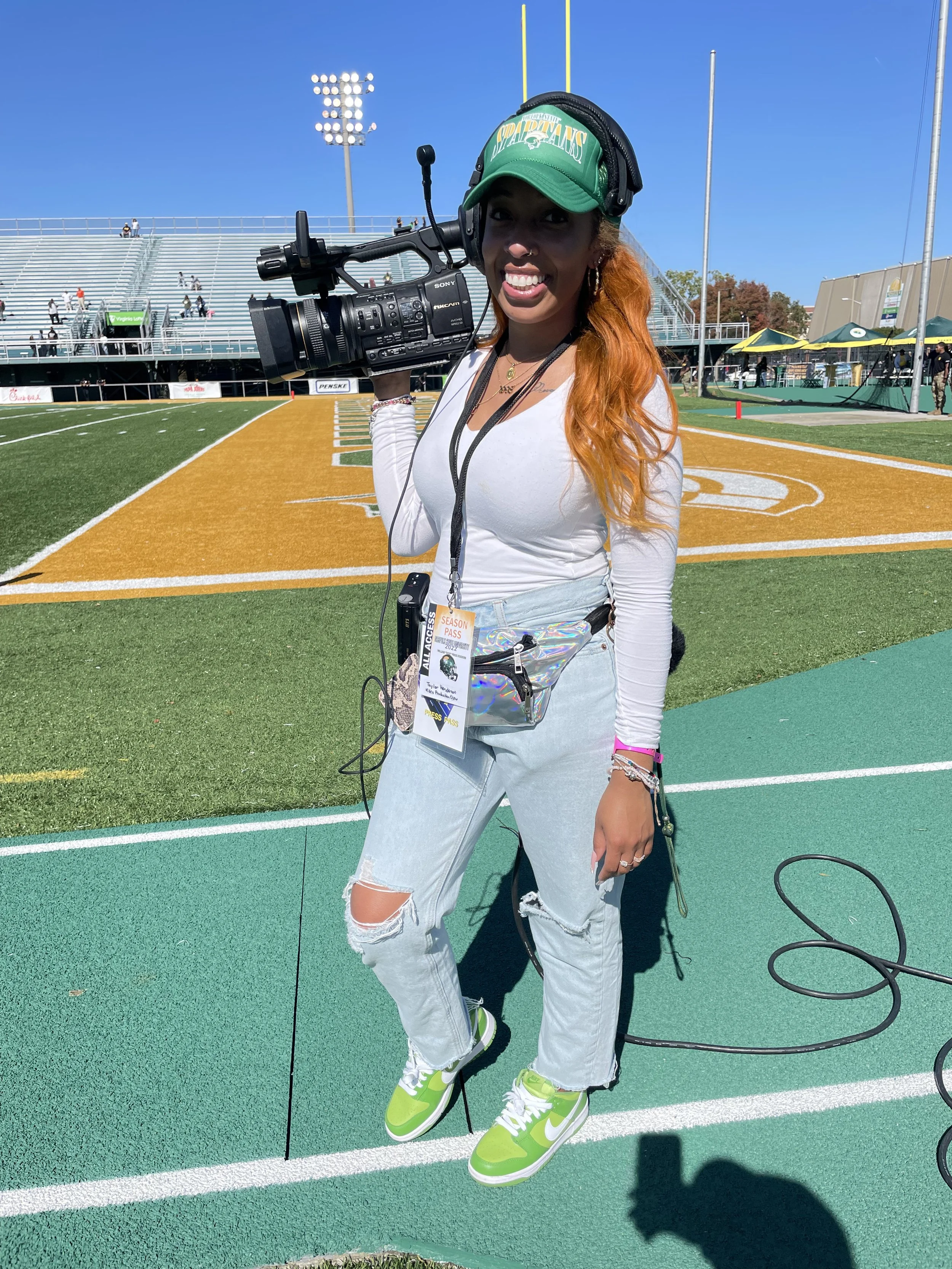 Sideline camera operator for NSU Homecoming game