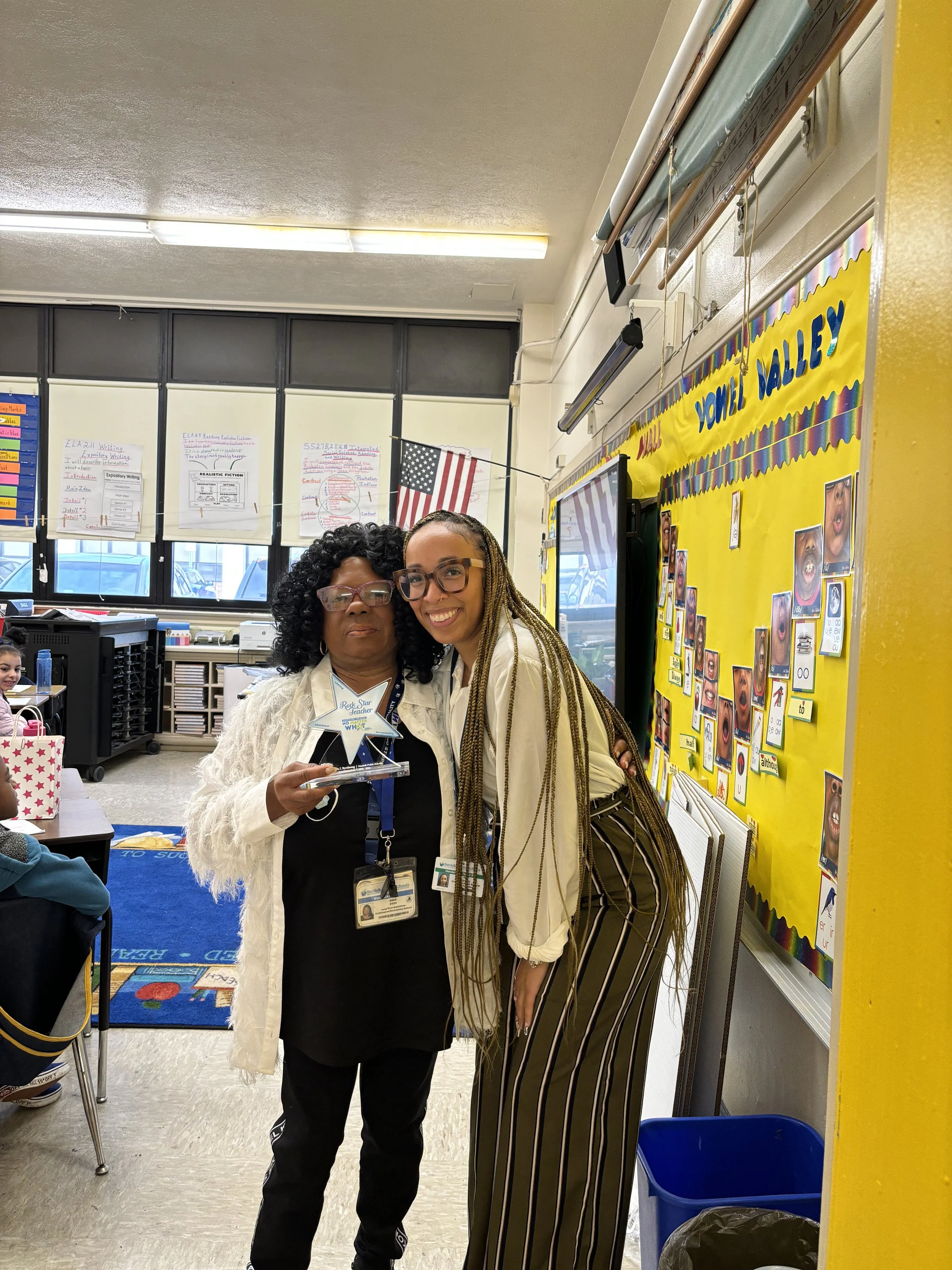 Presenting a former teacher and mom's former co-worker with the No Matter What award