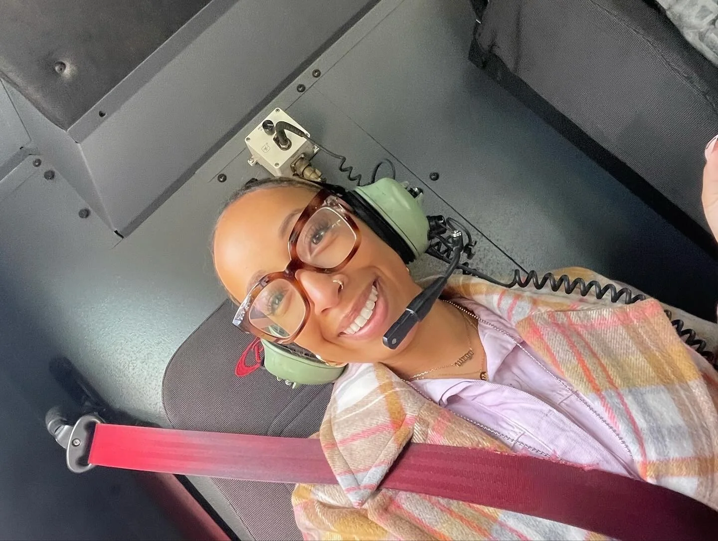 In the back of a fire truck riding to a school for the Attendance Challenge