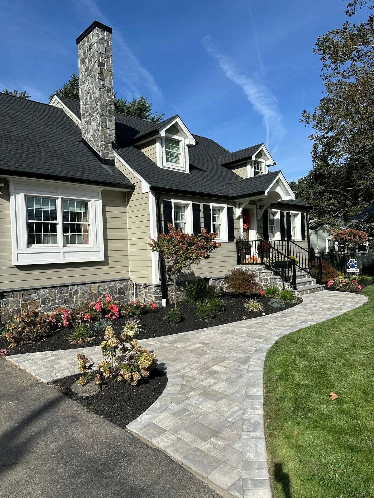 Custom paver walkway installation leading to a beautiful front entrance. — Green Nature Landscape Design