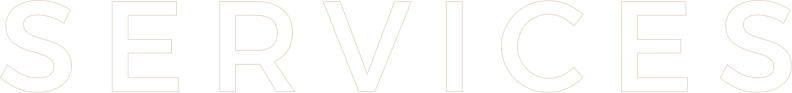 Close-up of a black sign with the word 'SERVICES' in outlined letters.