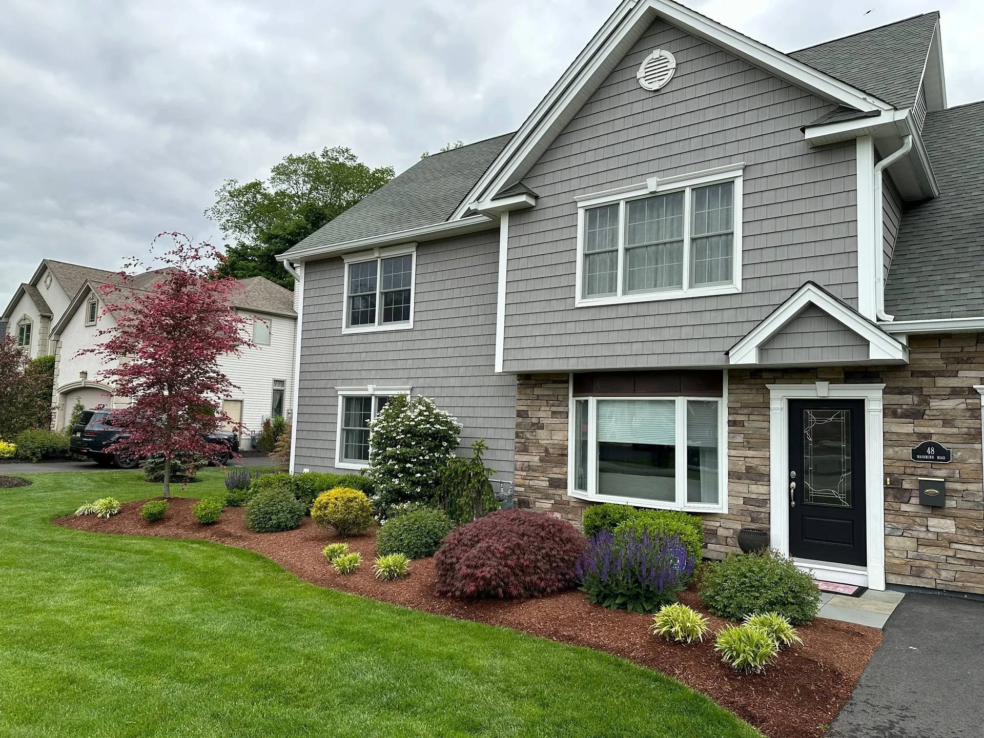 A healthy lawn maintained by professional landscape company. - Green Nature Landscape Design