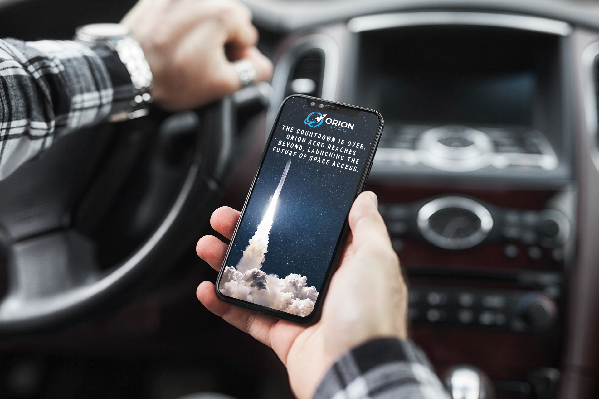 mockup-of-a-man-holding-an-iphone-11-pro-in-his-car-2120-el1.png