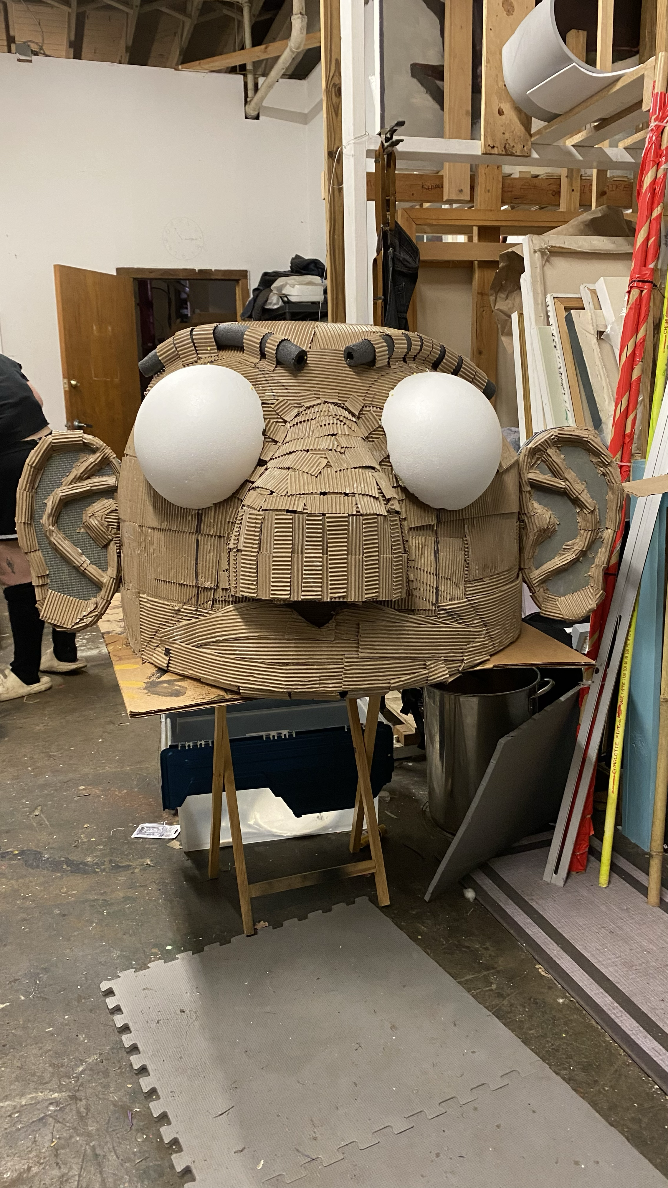 A wearable giant puppet head - backpack rig style - that is in process here.
