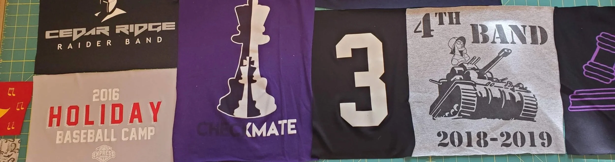 A collage of five T-shirts with various logos and text, including a Cedar Ridge Raider Band shirt, a 2016 Holiday Baseball Camp shirt, a CHARTMATE shirt, a 4th Band shirt with a girl on a tank, and a shirt with a large number 3.