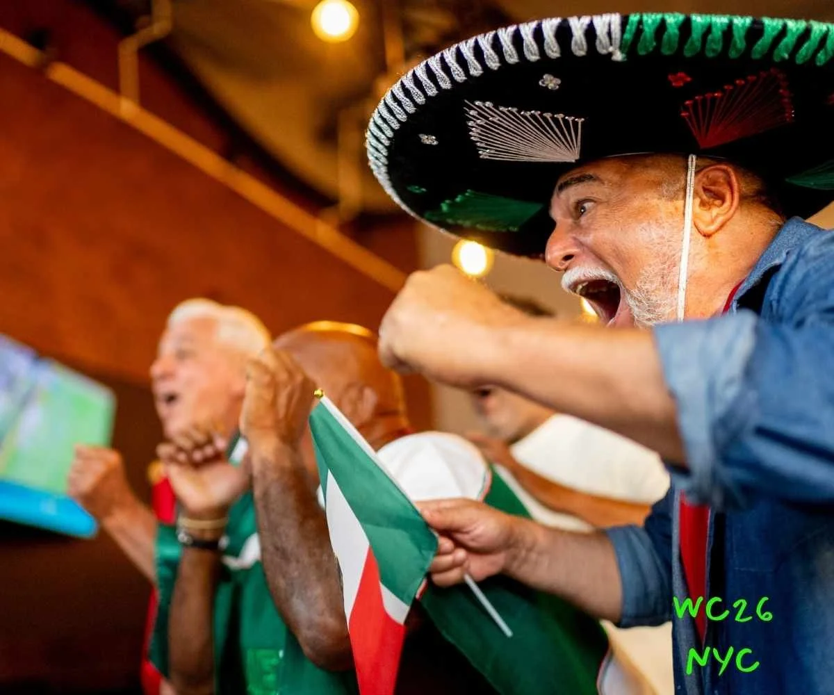 International football fans wearing sombreros and chanting inside top Hell's Kitchen soccer bars.