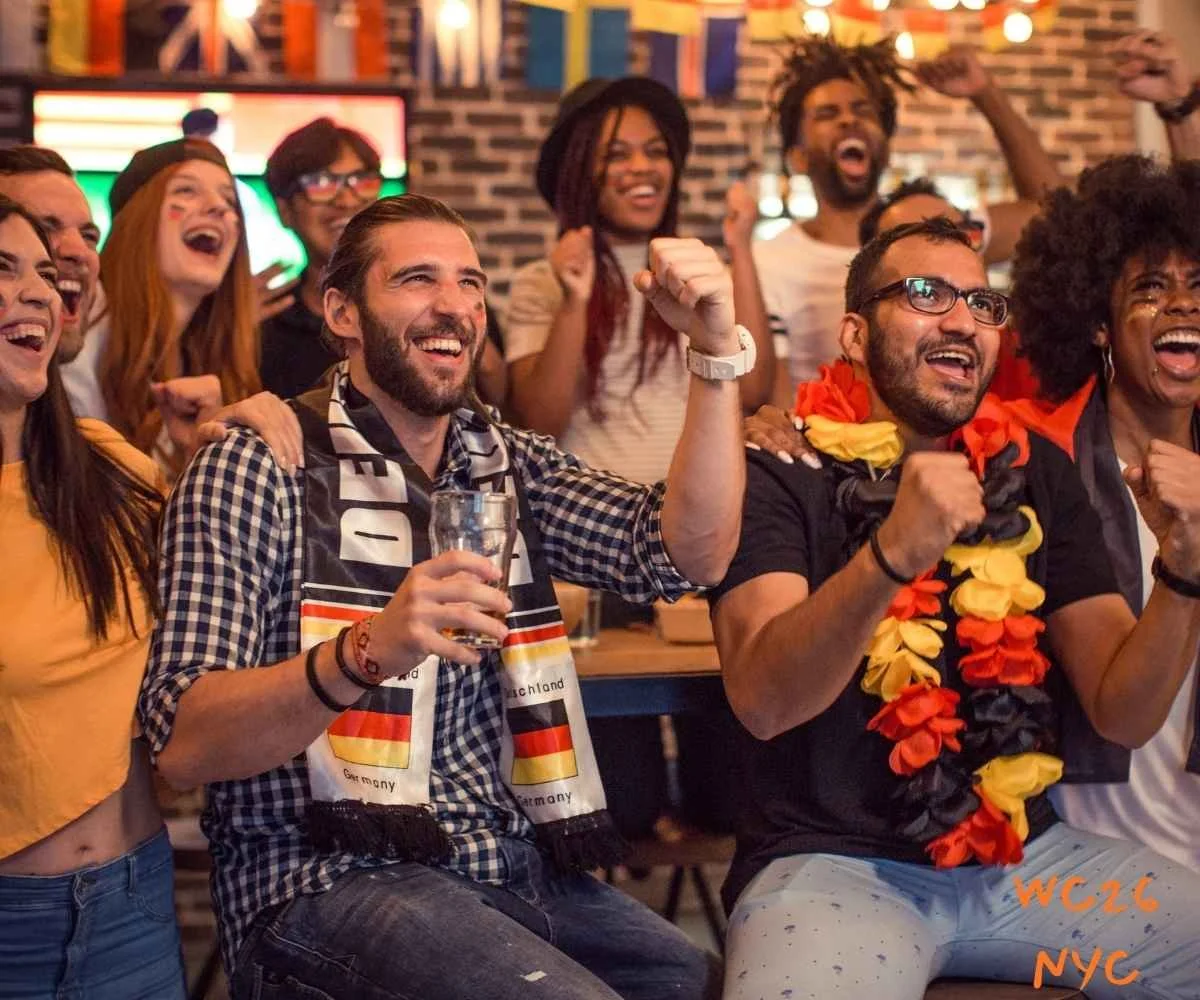 Packed crowd of soccer supporters watching a match at top 7th Ave sports bars near Madison Square Garden.