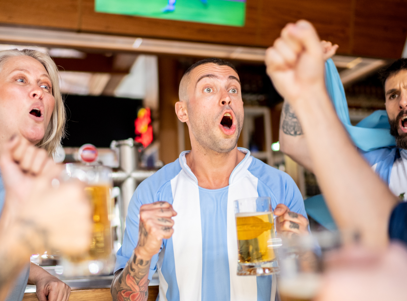 Die-hard Argentina supporters erupting in celebration near the Times Square Fan Zone, capturing the high-stakes matchday energy of a 2026 World Cup watch party in the heart of Manhattan.