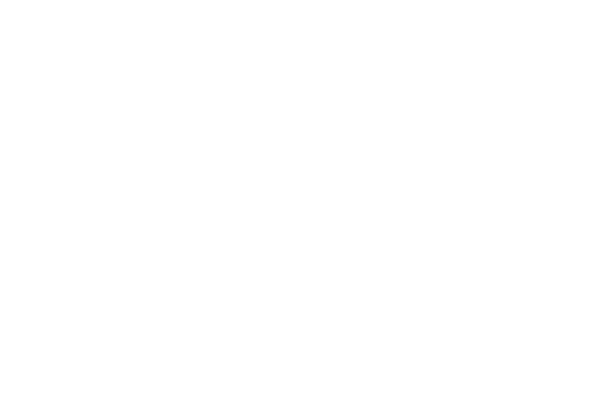 Black and white image of a banana and a computer mouse, separated by a diagonal white line.