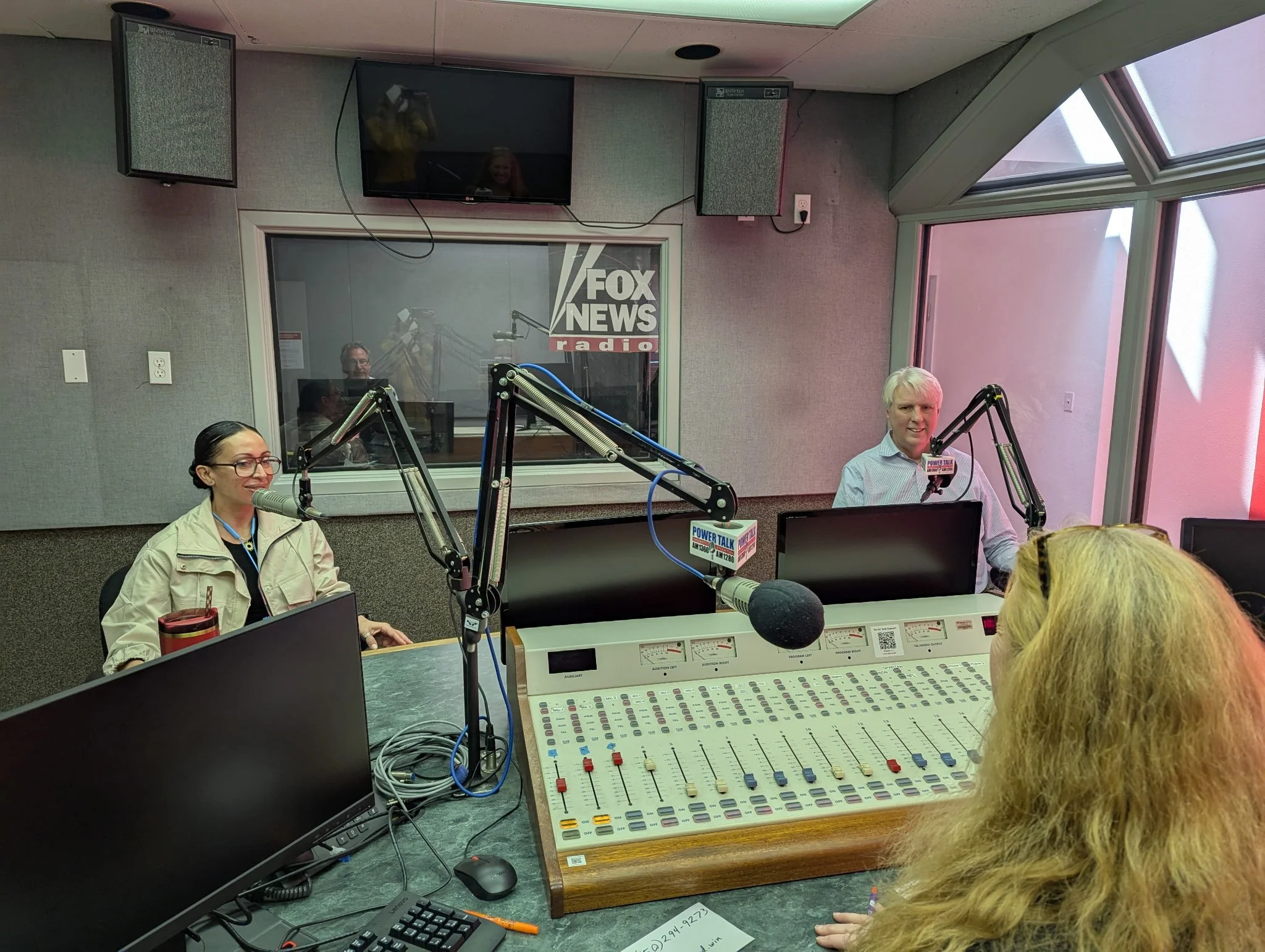 In the radio station studio with Jeanette, Alec, and Mari.