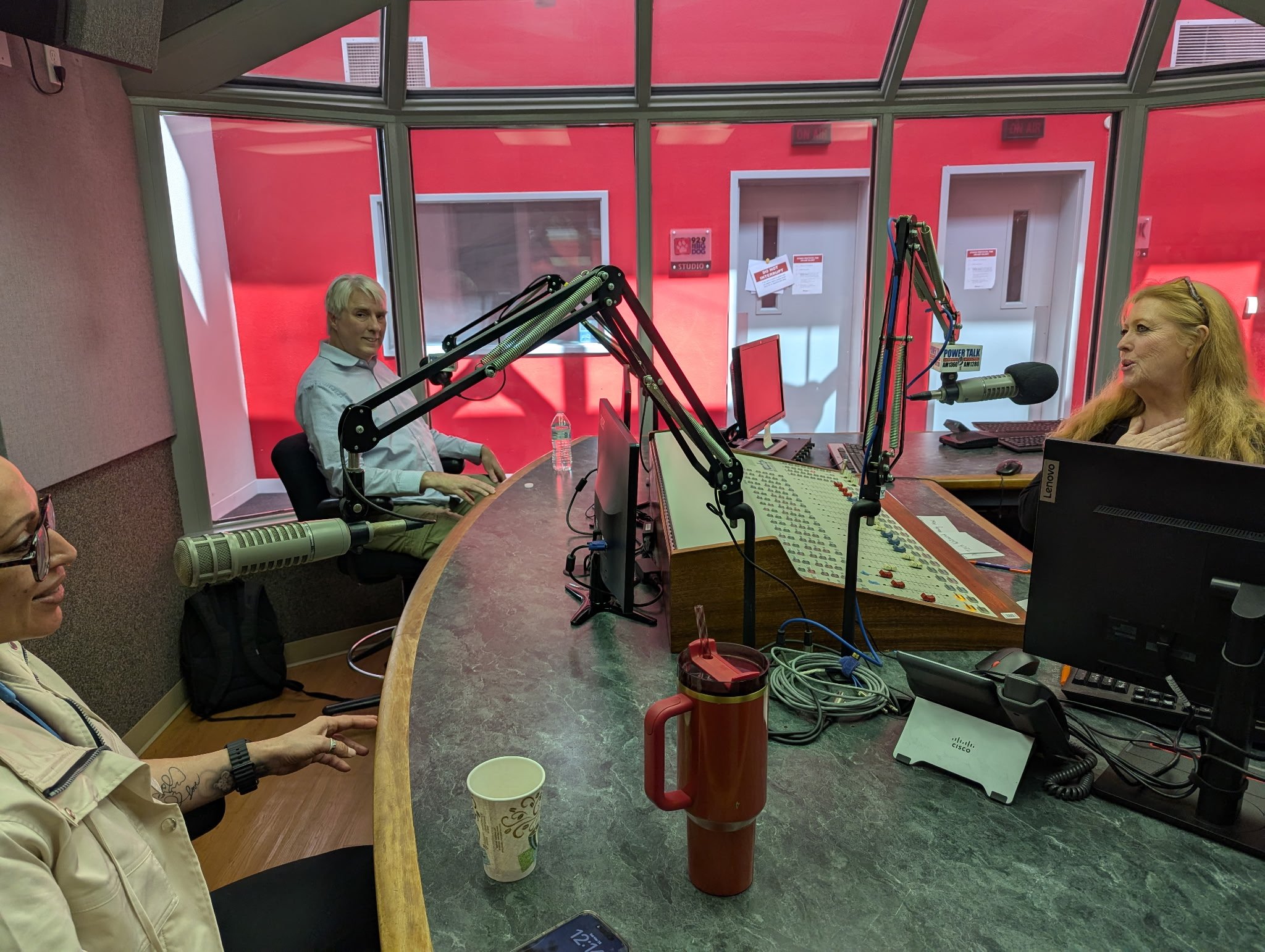 Jeanette and Mari talk with Alec the tech wizard about his website building business.