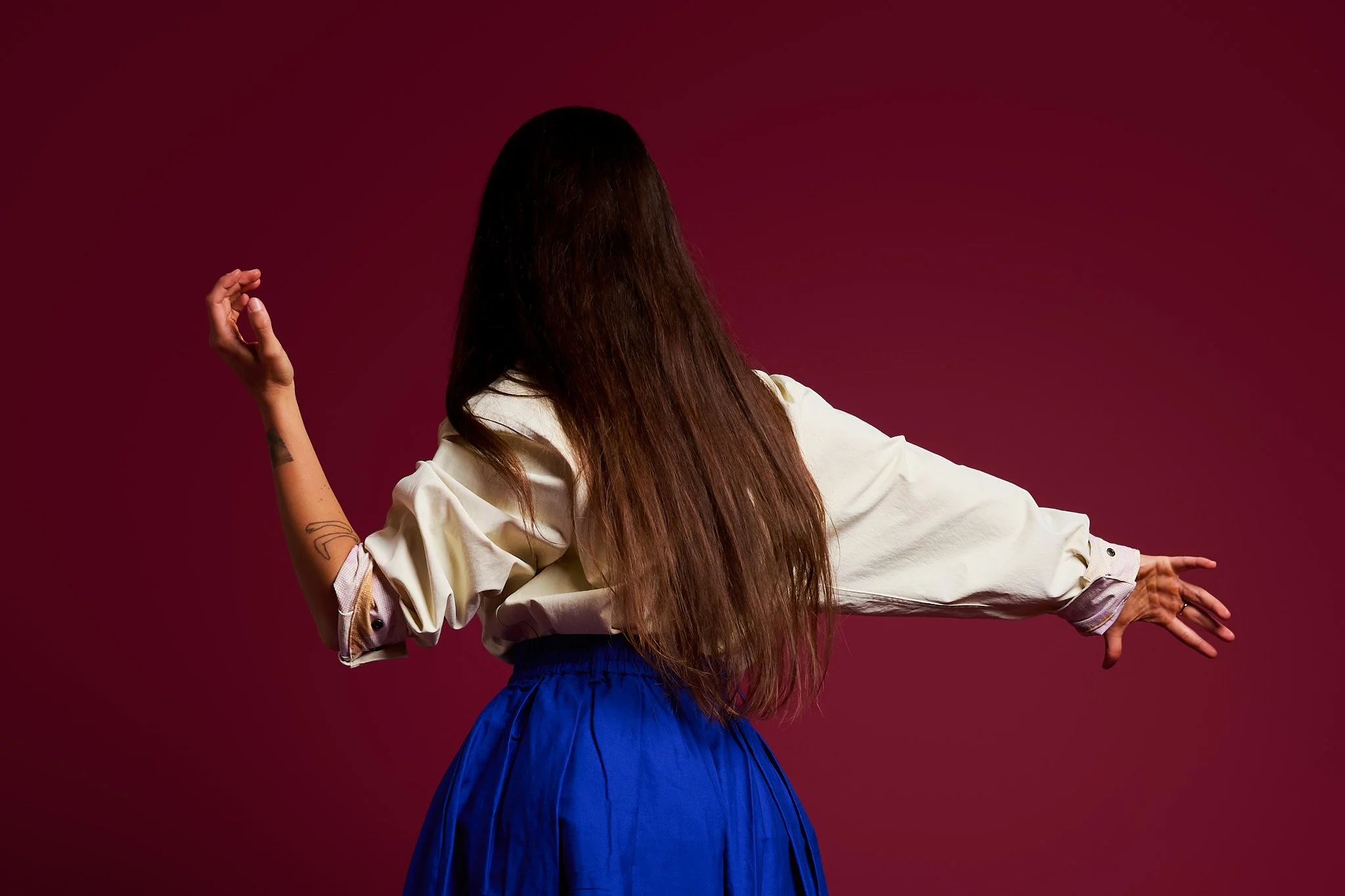 Woman in slow, mindful movement practice.