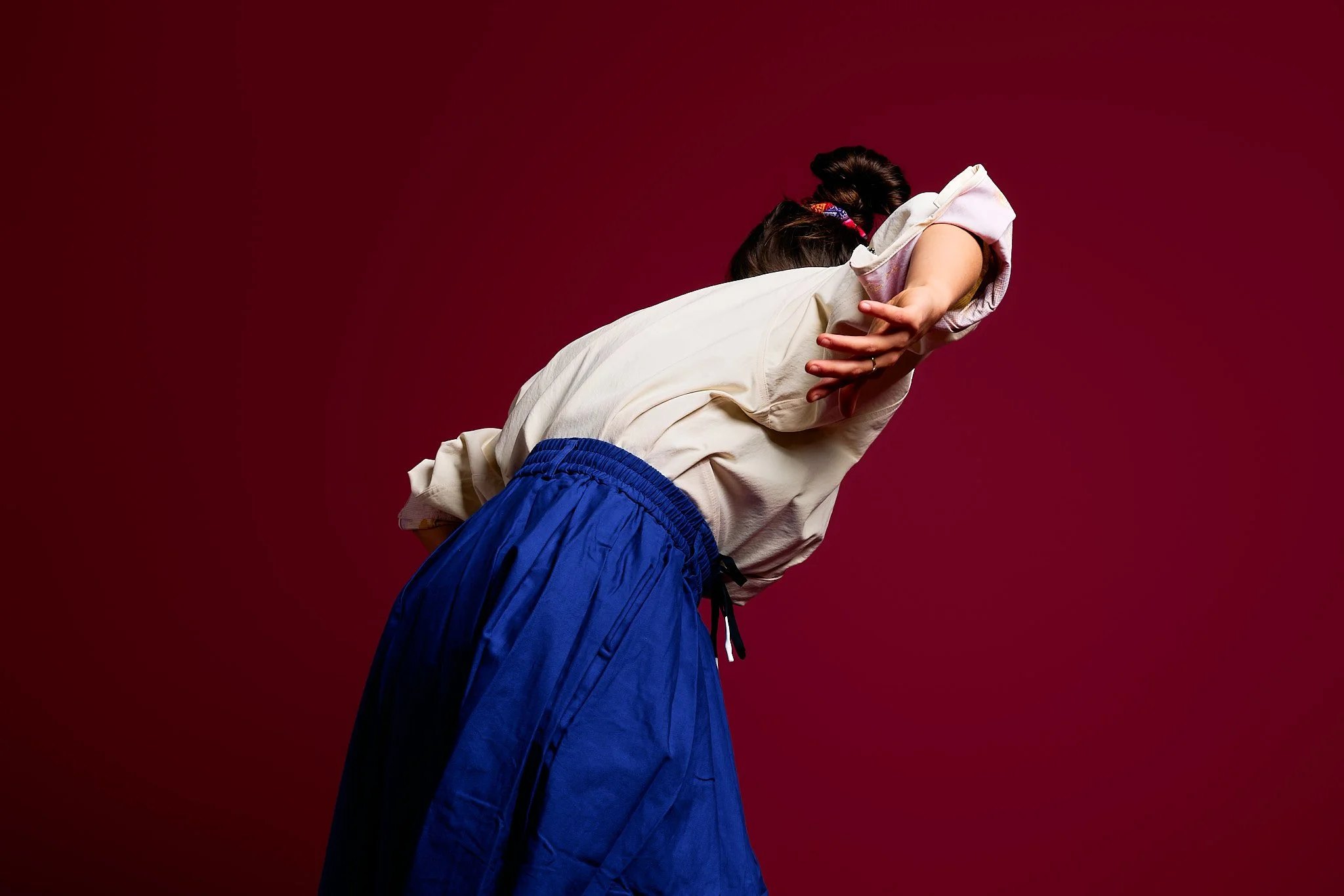 Woman in slow, mindful movement practice.