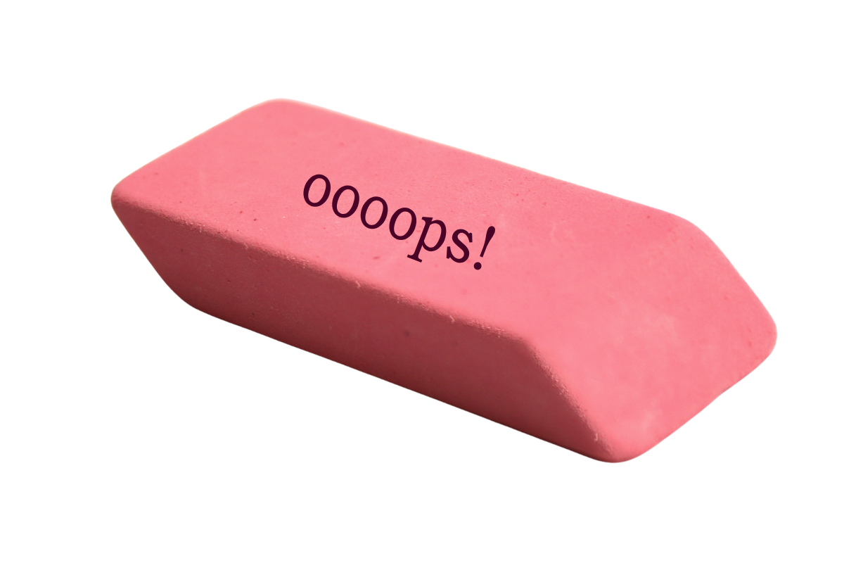 pink rubber eraser with the word oops on it