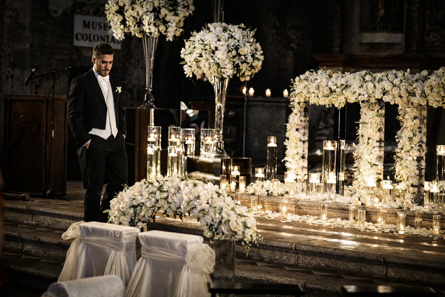 groom walking through ceremony space