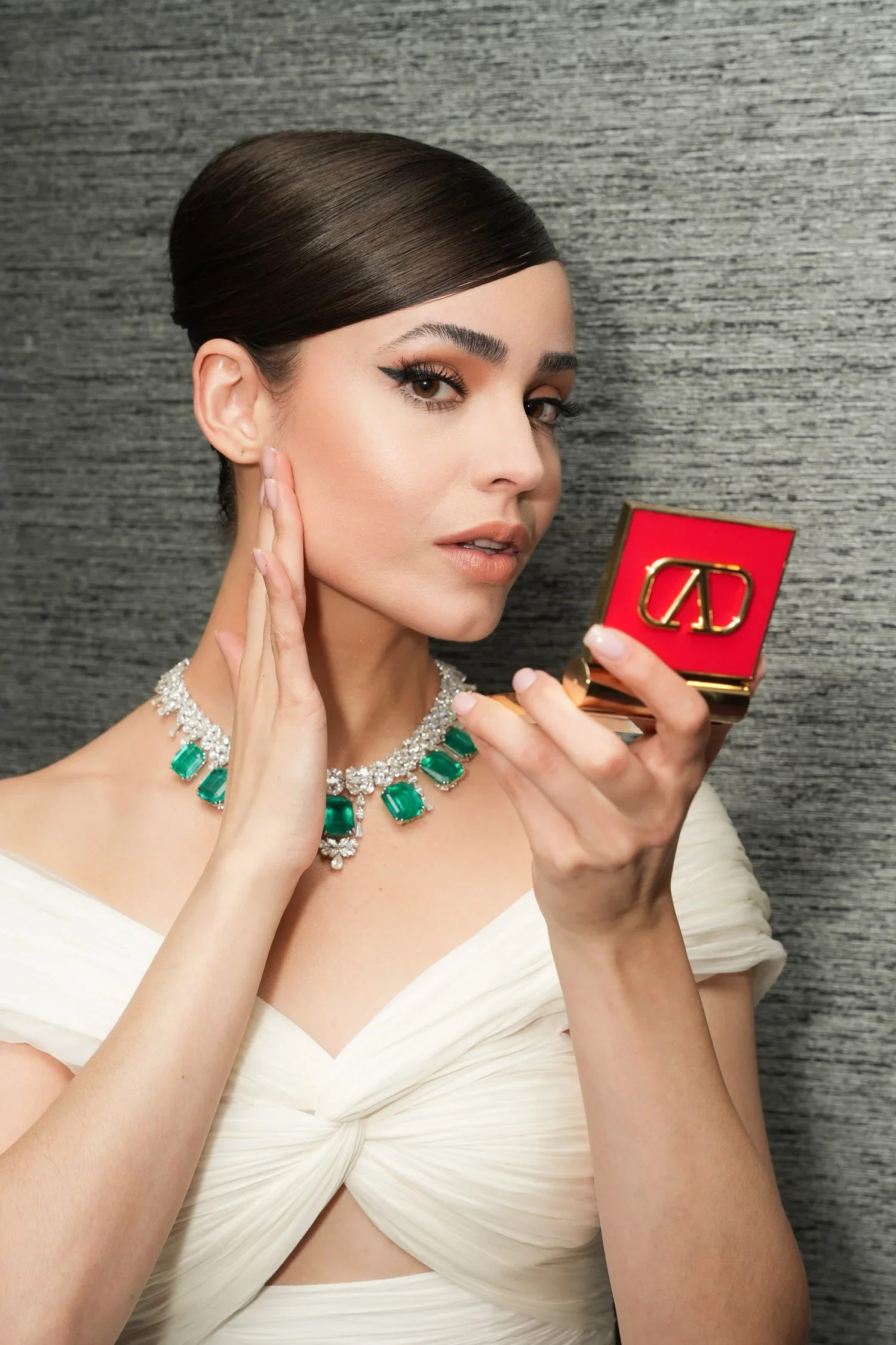 A clean, modern beauty portrait highlighting glowing skin, refined makeup, and natural elegance.