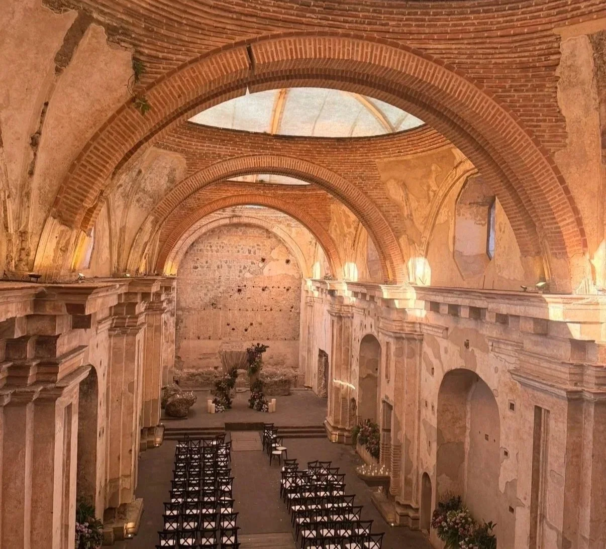 luxury wedding venue interior with arches and warm lighting
