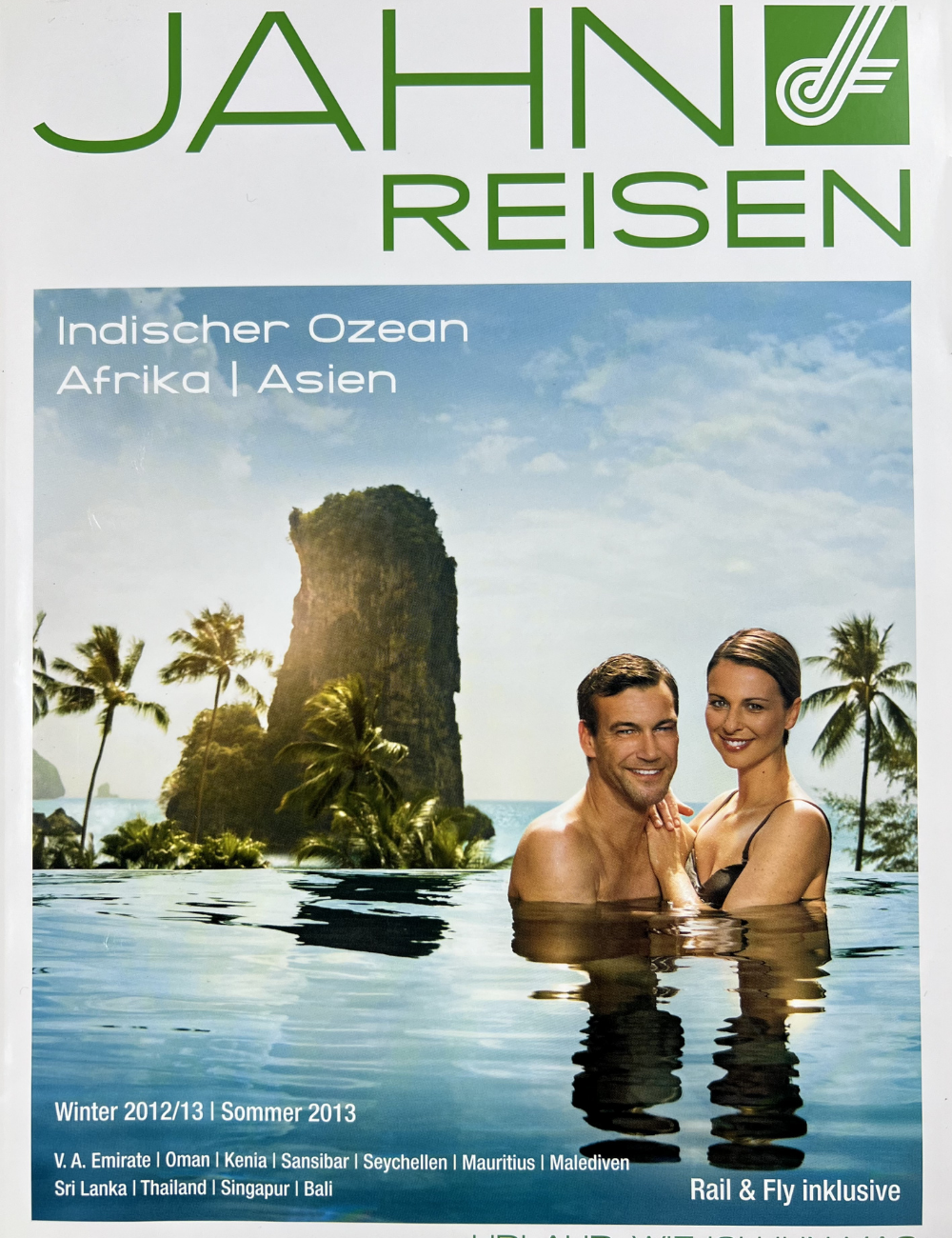 Travel brochure cover with a tropical scene, including a couple in a swimming pool, palm trees, and a tall rock formation in the background, promoting trips to the Indian Ocean, Africa, and Asia.