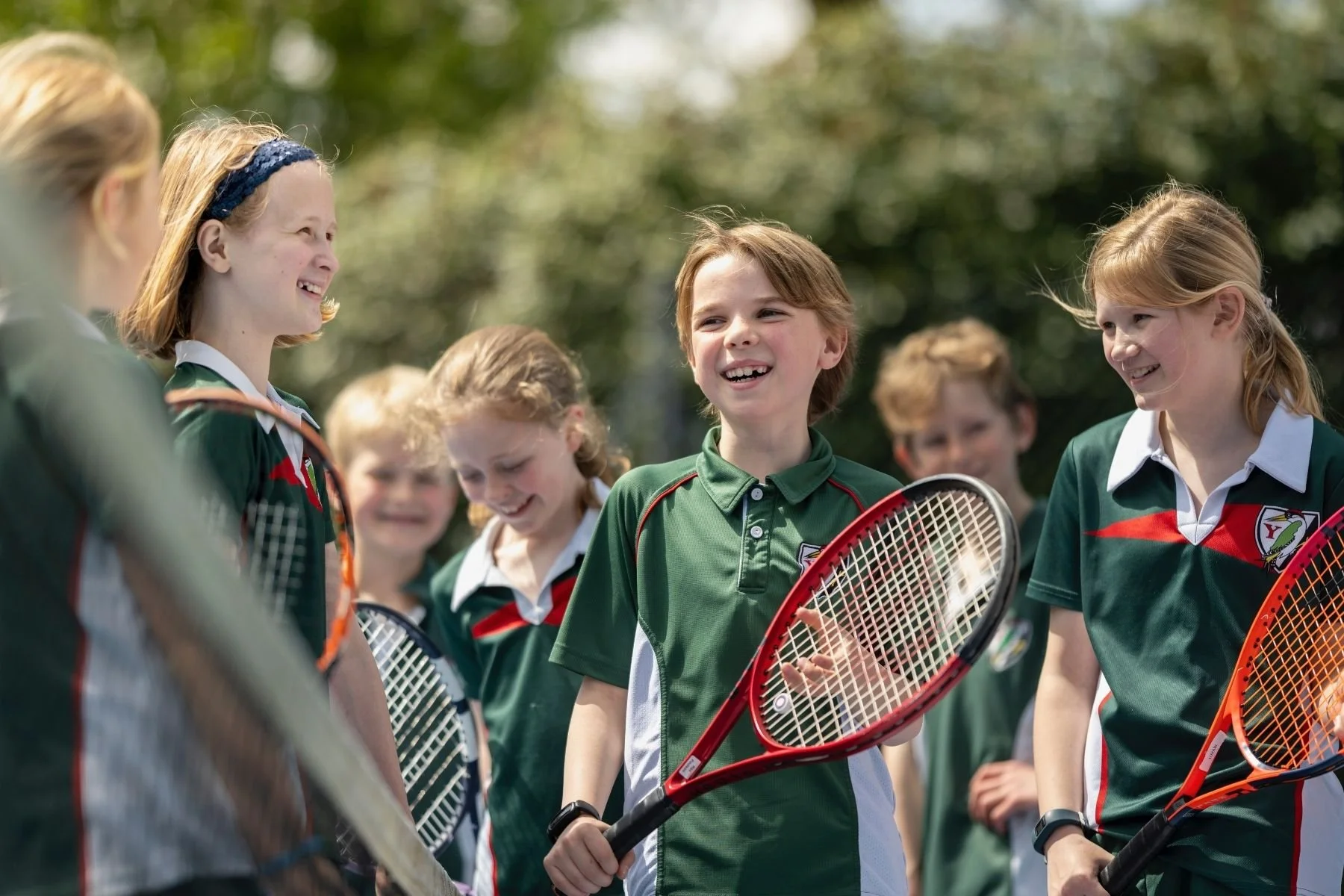 Pupils enjoying tennis at Yarrells School, an independent prep school set within six acres near Poole Harbour, Dorset