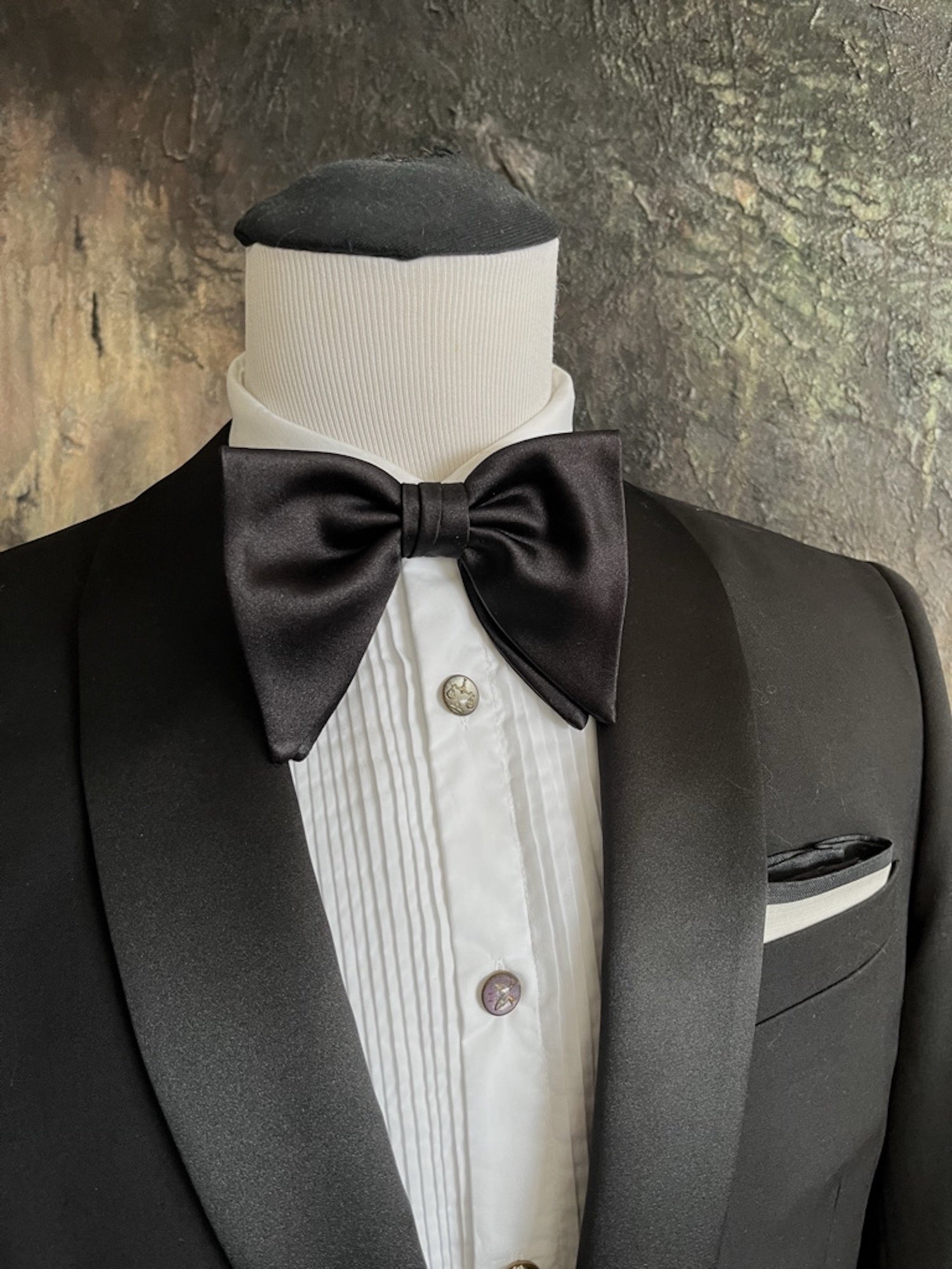 This is a classic large, Butterfly, bow tie.  It is self-tied.  Hand-made and elegant.