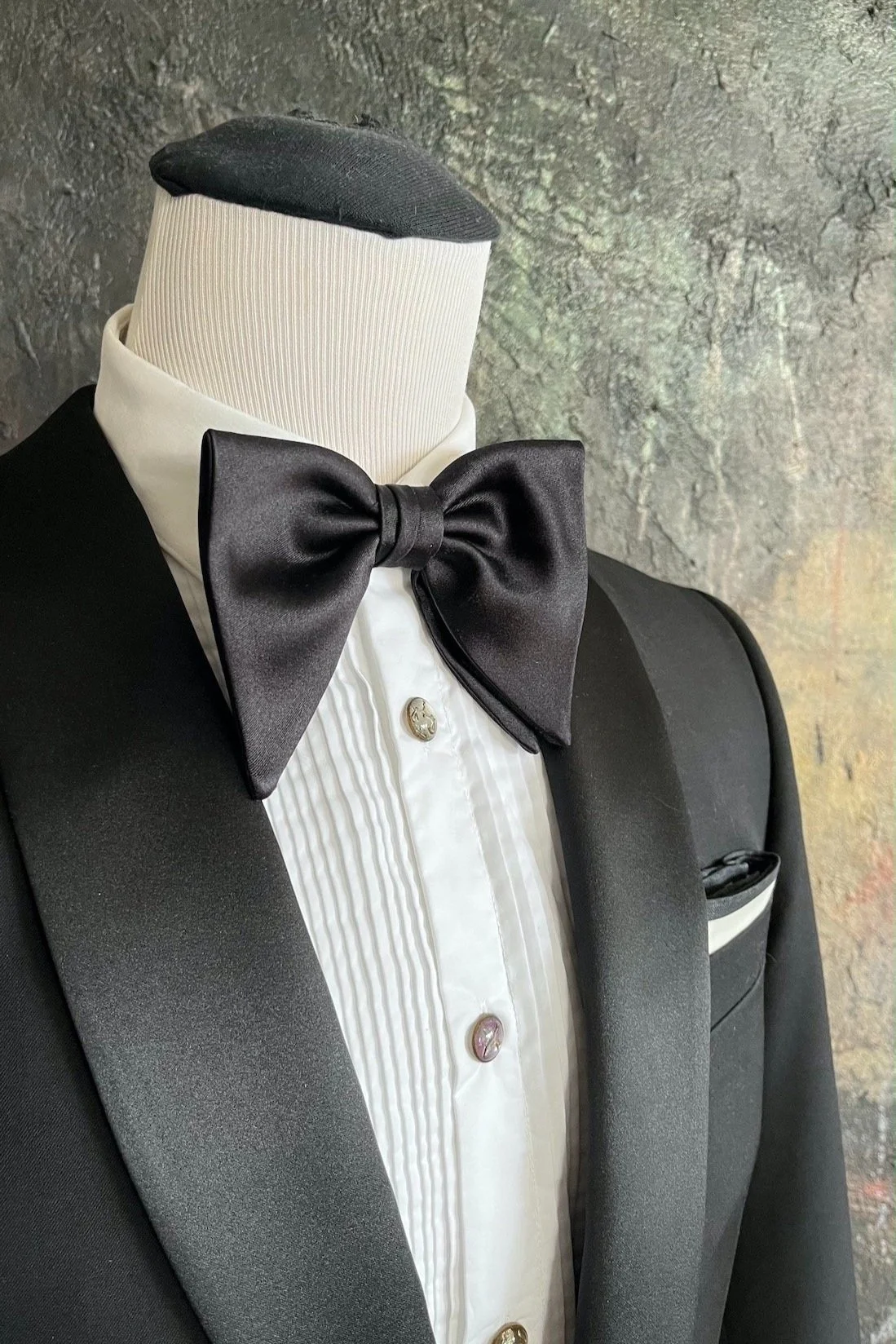 This is a classic large, Butterfly, bow tie.  It is self-tied.  Hand-made and elegant.