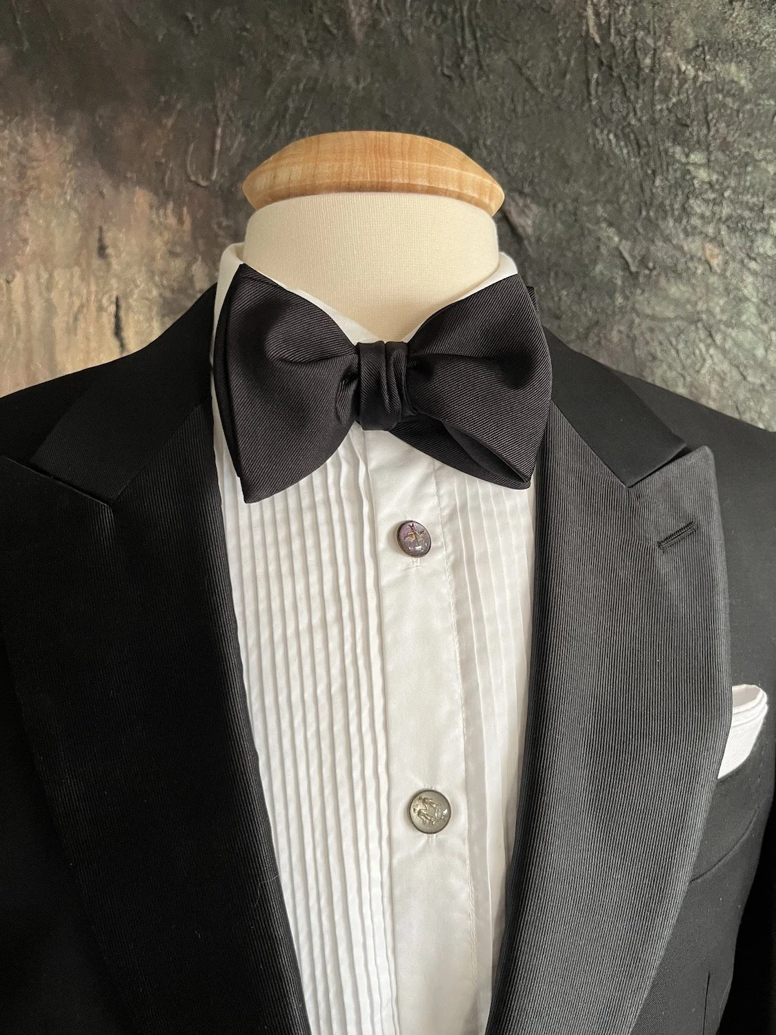 This is a large, black, grosgrain, butterfly, bow tie.  It is self-tied.
