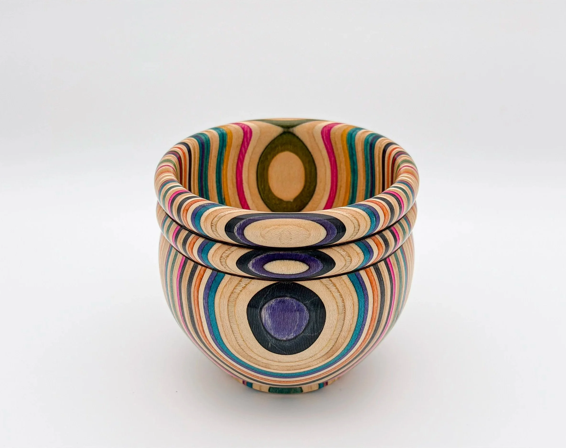 Handcrafted bowl turned from recycled skateboard decks by Blackburl Works in Fernie, British Columbia, Canada.