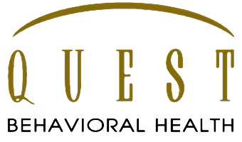 Logo with the word 'QUEST' in gold lettering and a gold curved line above it.