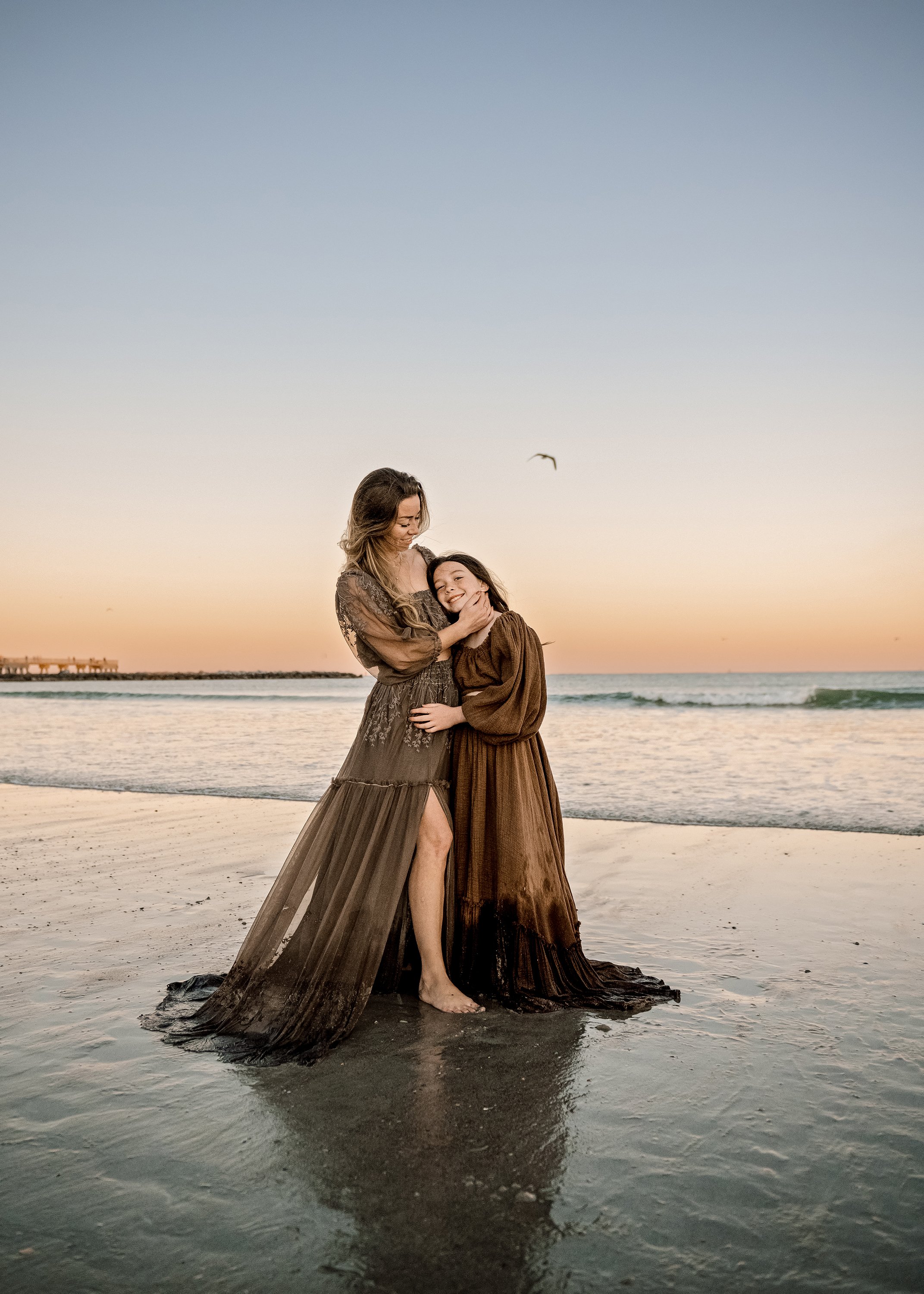 Motherhood, mother and daughter photo session on Anna Maria Island at sunset.