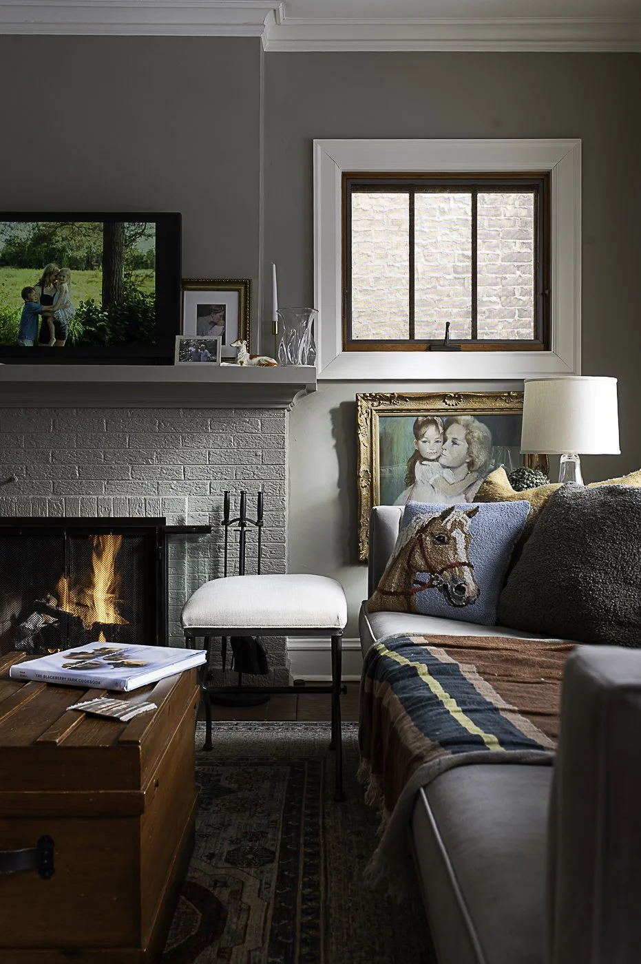 Please explain your favorite ritual, time of day, or room in your home.
I love starting my mornings in the living room, having coffee with my husband and our Cavaliers. During the winter, we turn on the gas log set, which makes the space feel incredi