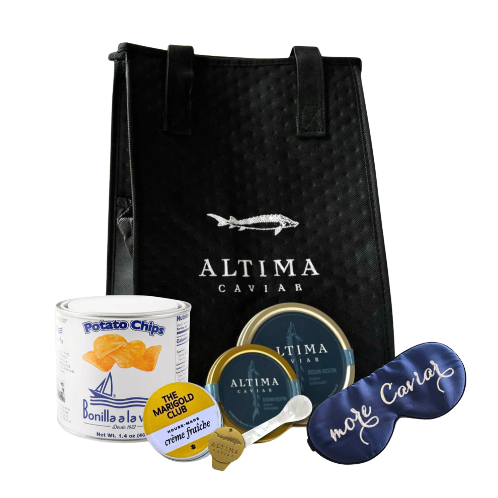 The Altima Caviar Jet Pack. Perfect for flight or a road trip, it has everything you need to make the moment an occasion. Includes a petite tin of gourmet potato chips, creme fraiche, mother-of-pearl spoon, caviar key, a 'More Caviar' sleep mask (whi