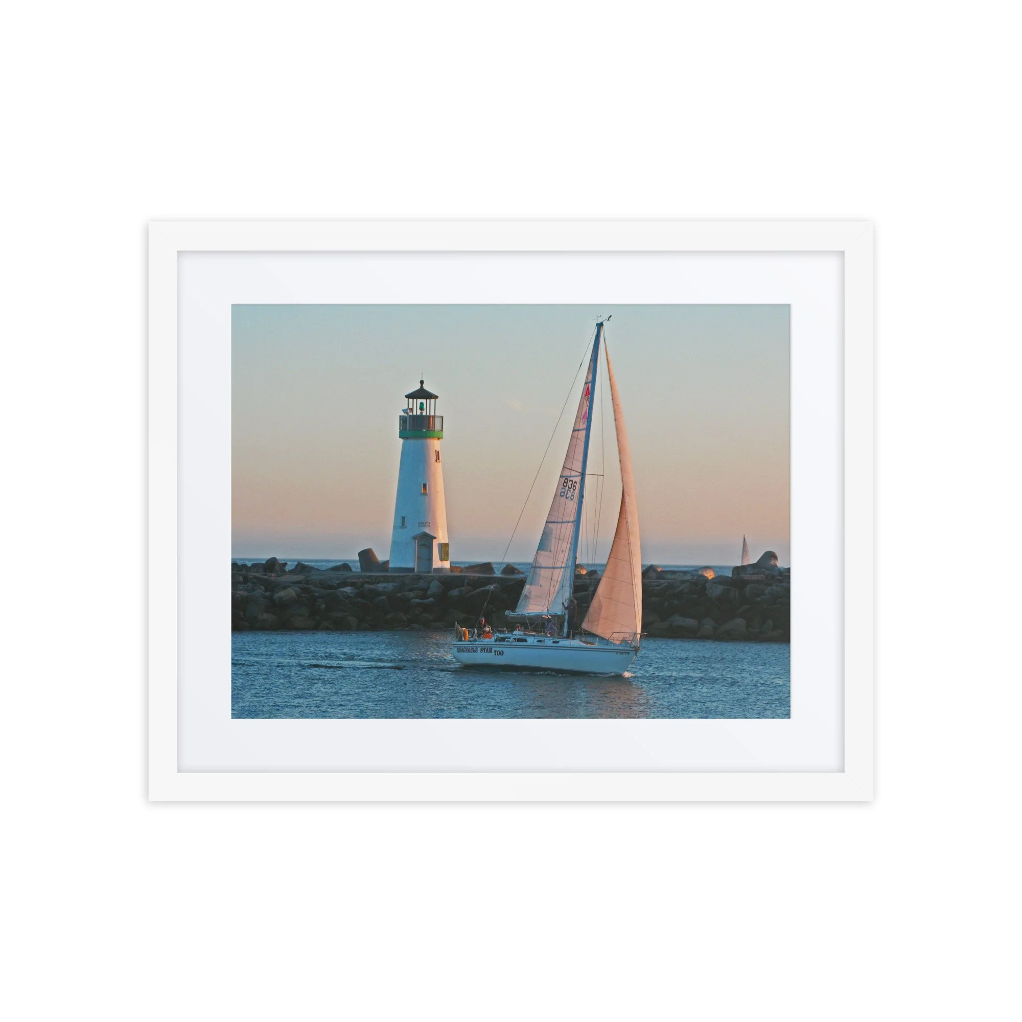 Lighthouse Sailboat Framed Print