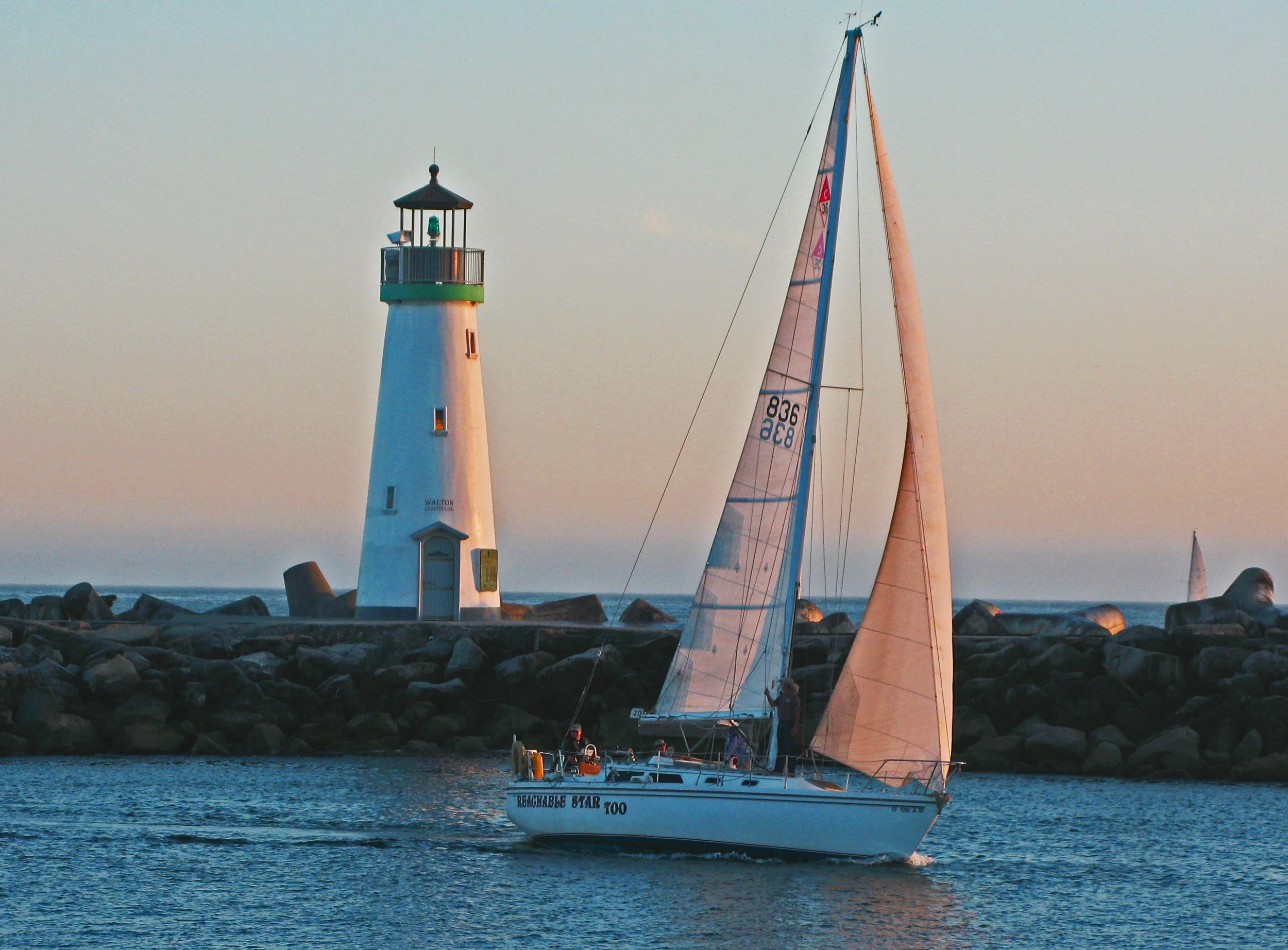 Lighthouse Sailboat
